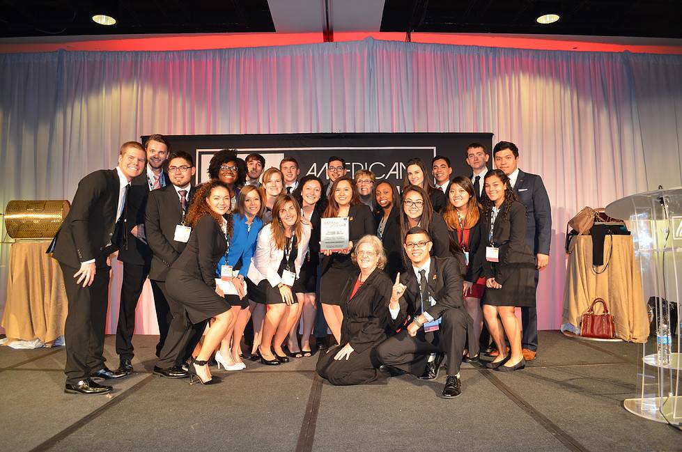 AMA members with Platinum Circle trophy