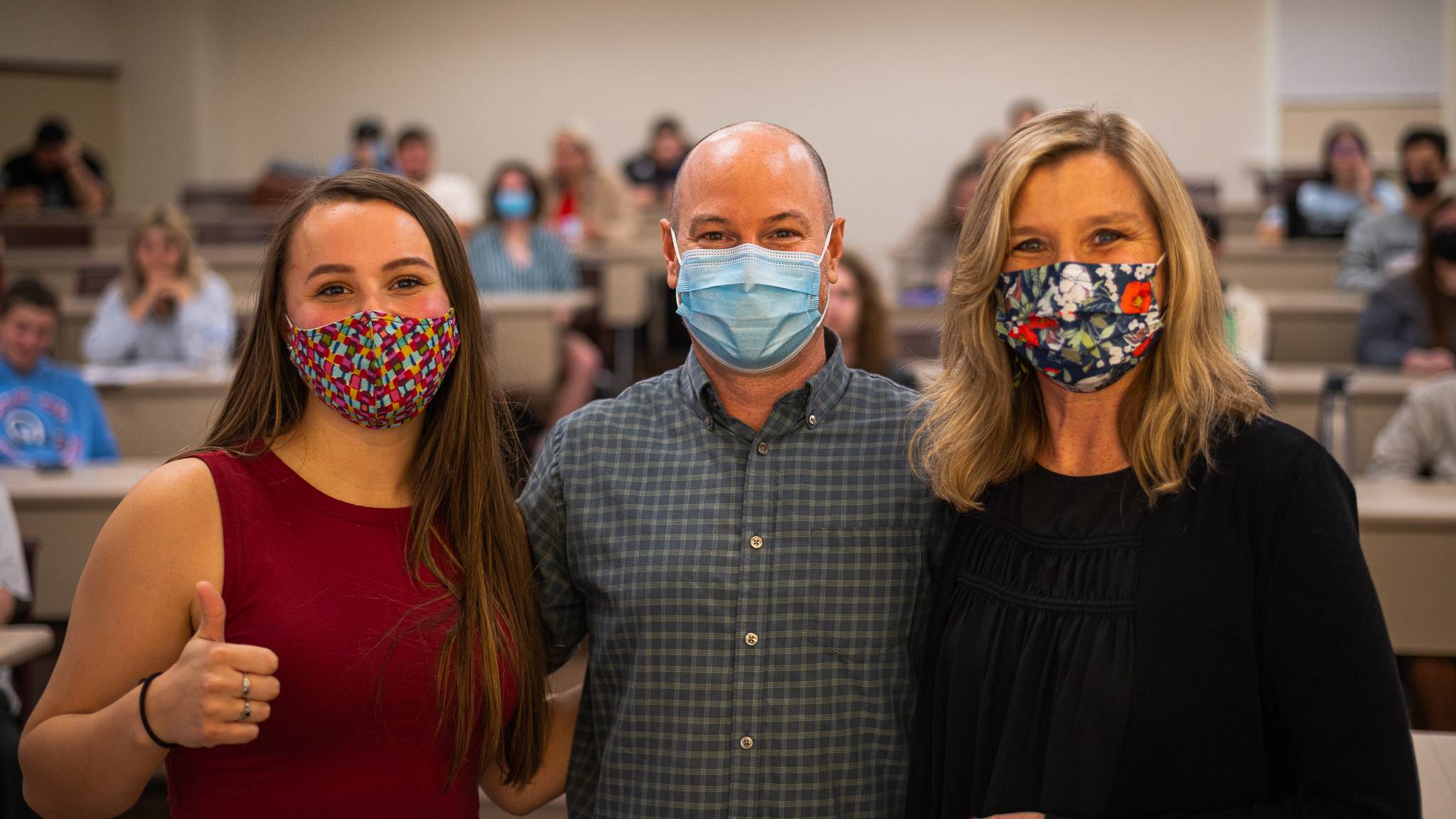 an image of the club president, the faculty advisor, and the chair of the department