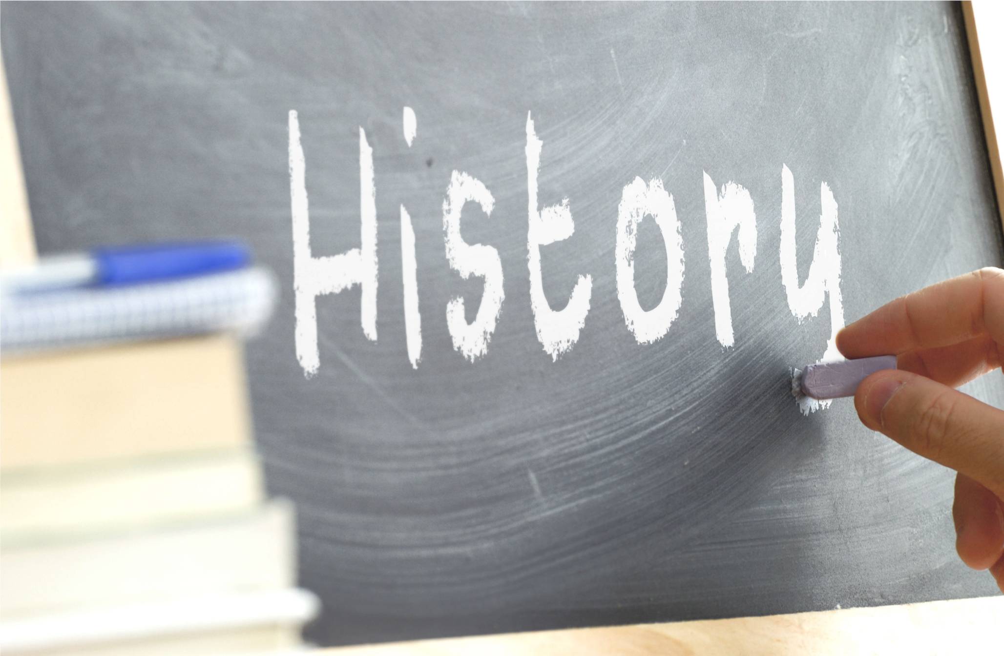 History written on a chalk board.