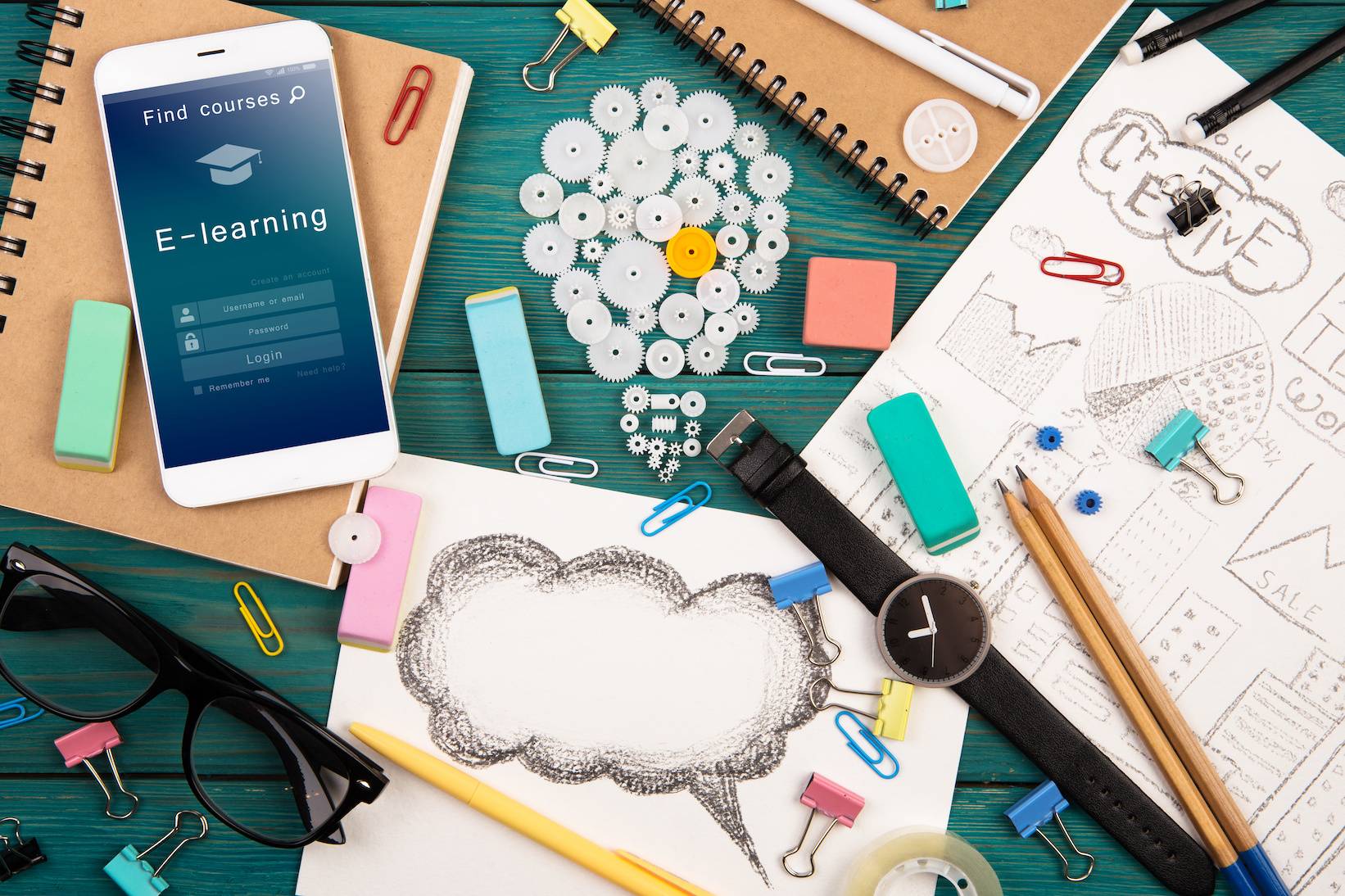 various design tools laid around a worktable