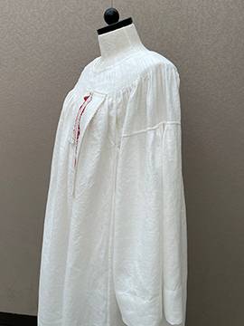 Gown with embroidery from side