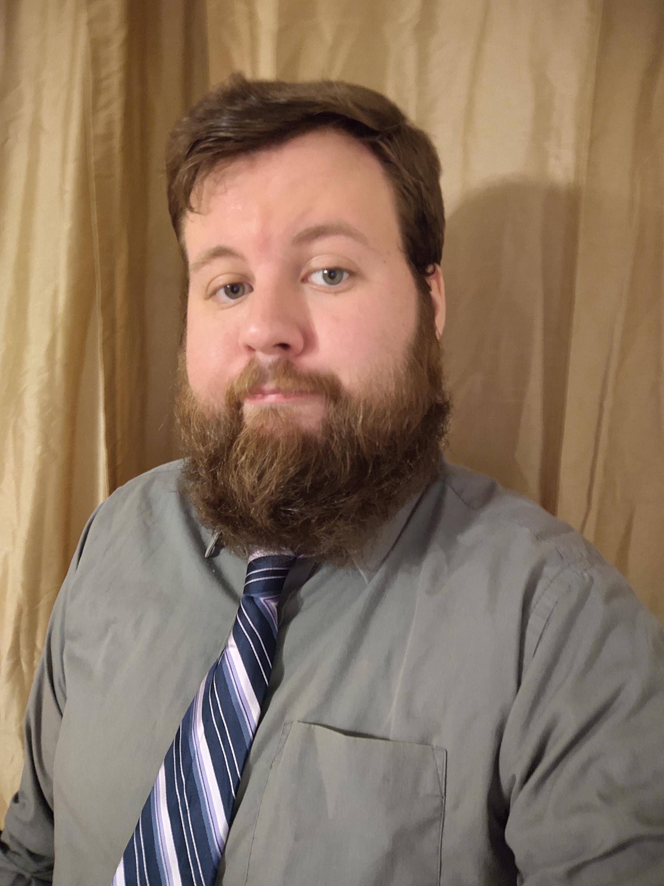 man with beard, wearing tie