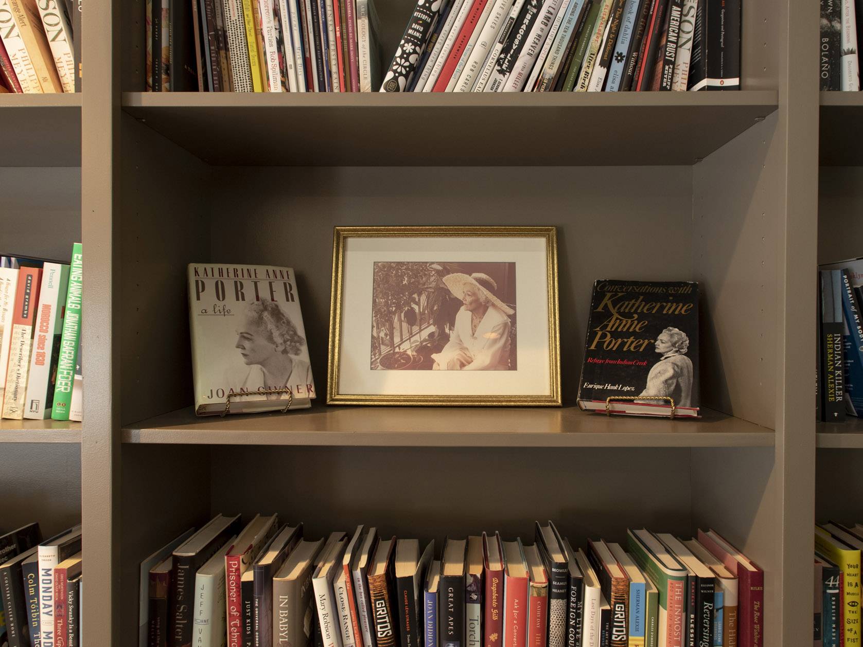 frame of katherine anne porter on bookshelf