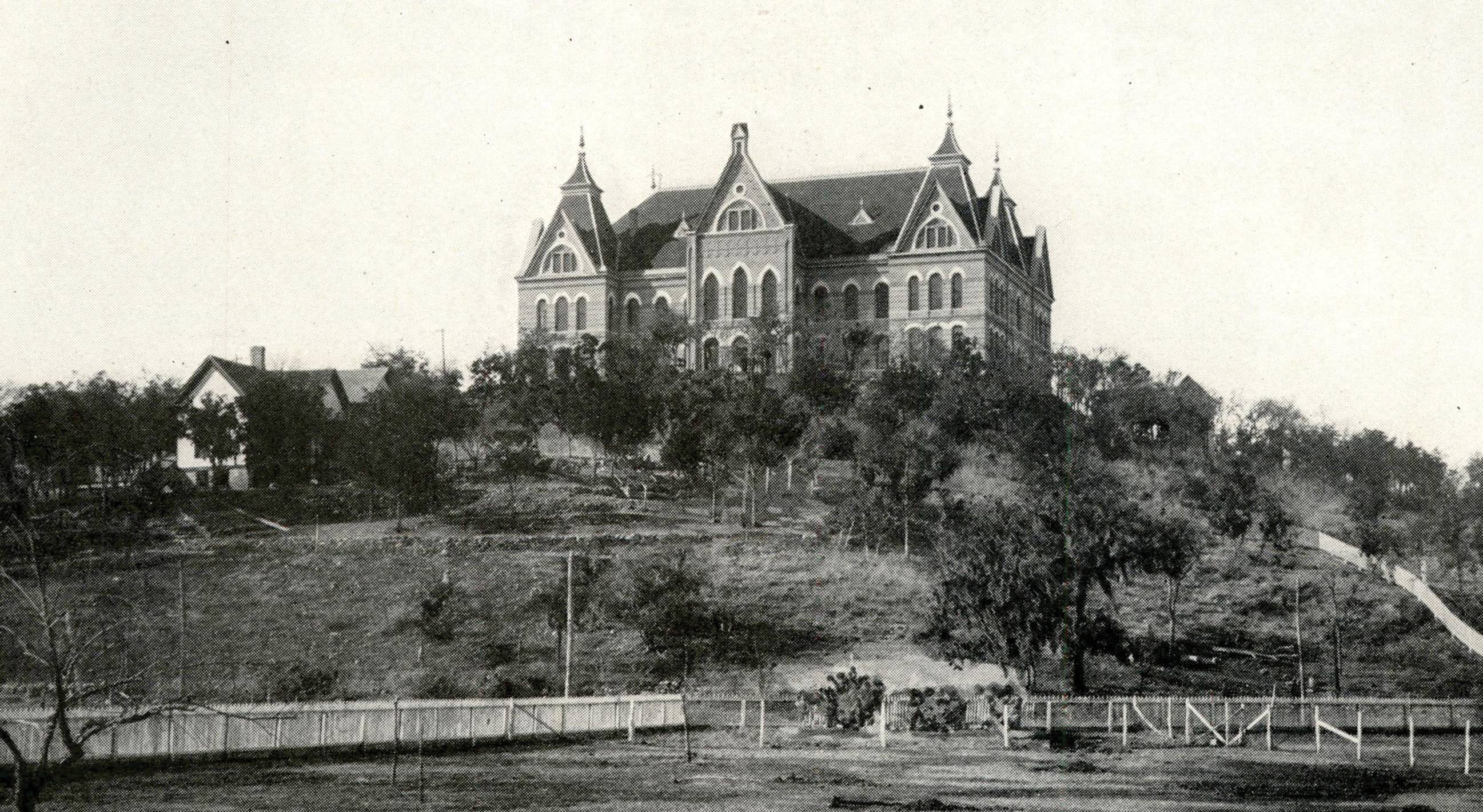 black and white photo of old main