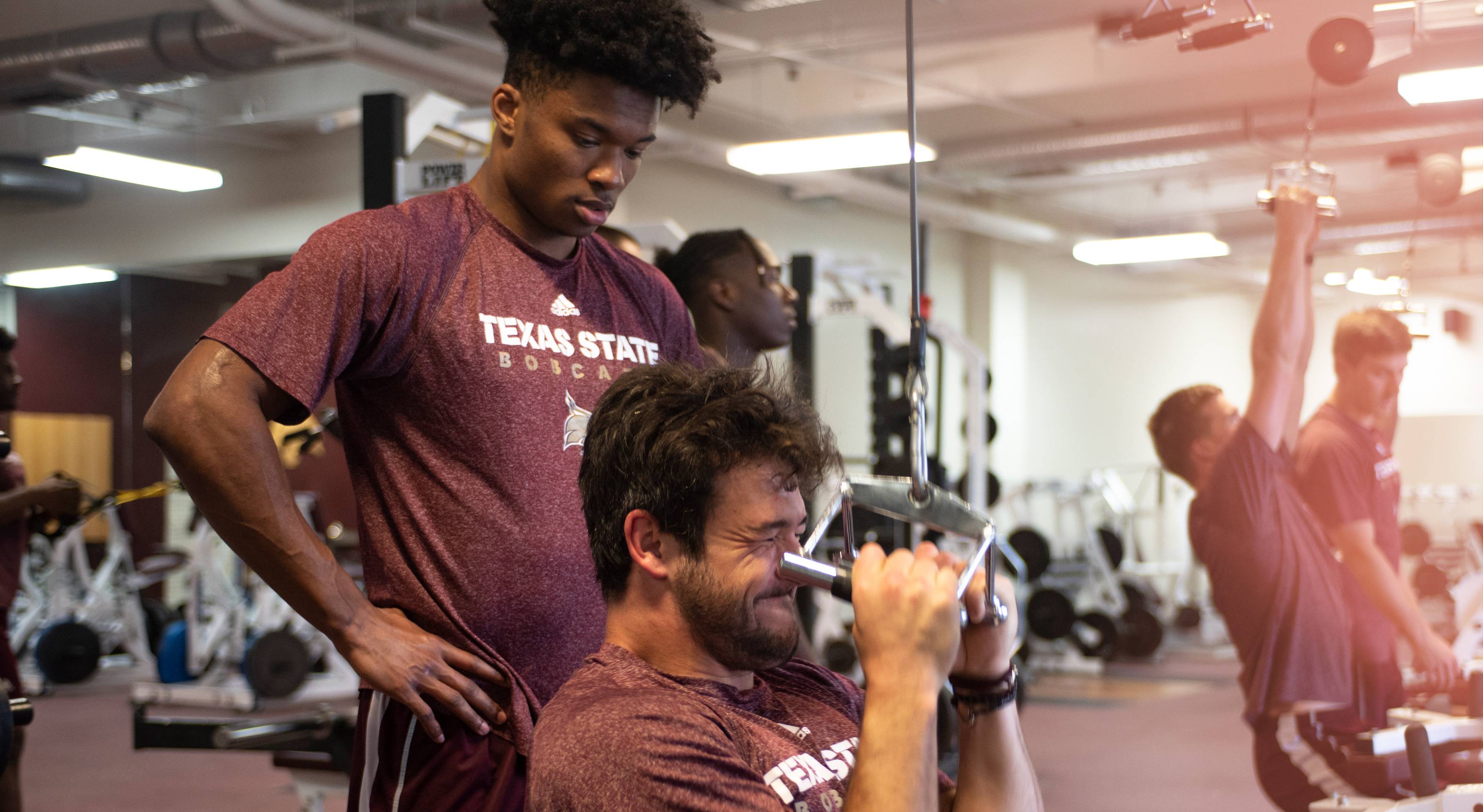 football players working out