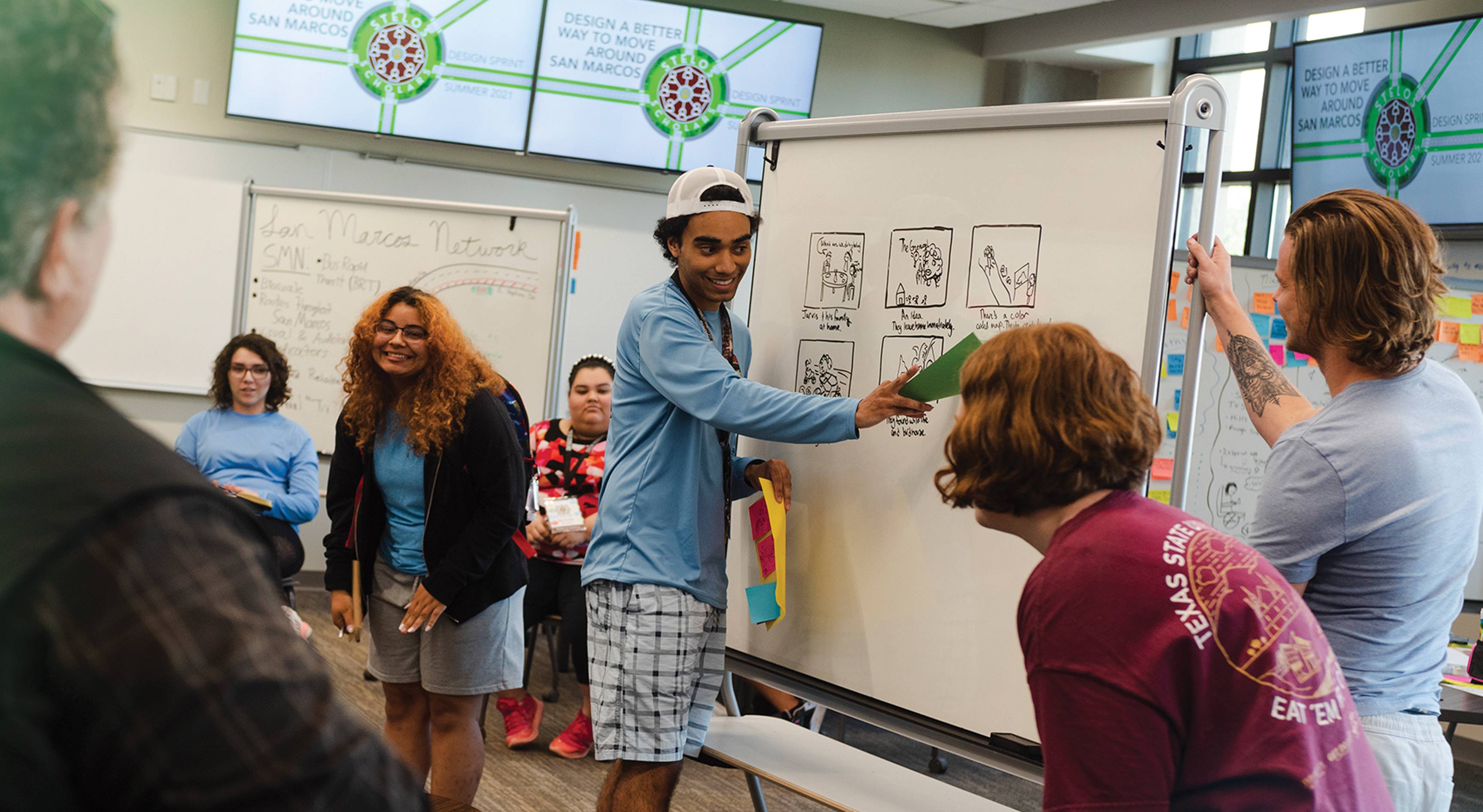 students working on whiteboard