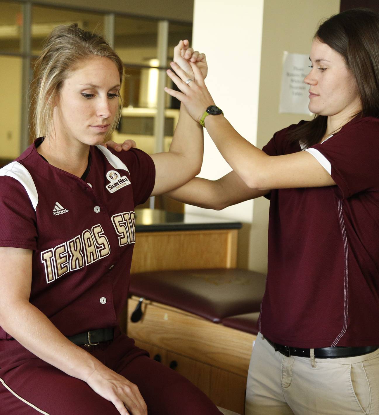 trainer working with student athlete