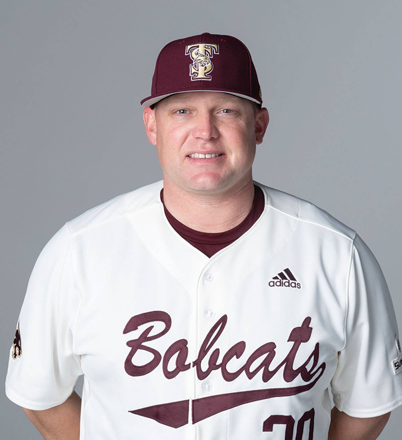 man in baseball uniform