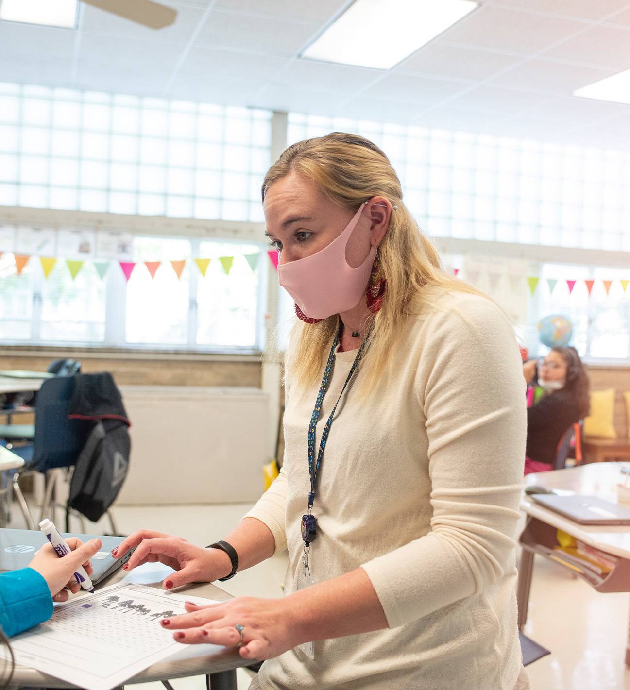 female teacher wearing facemask