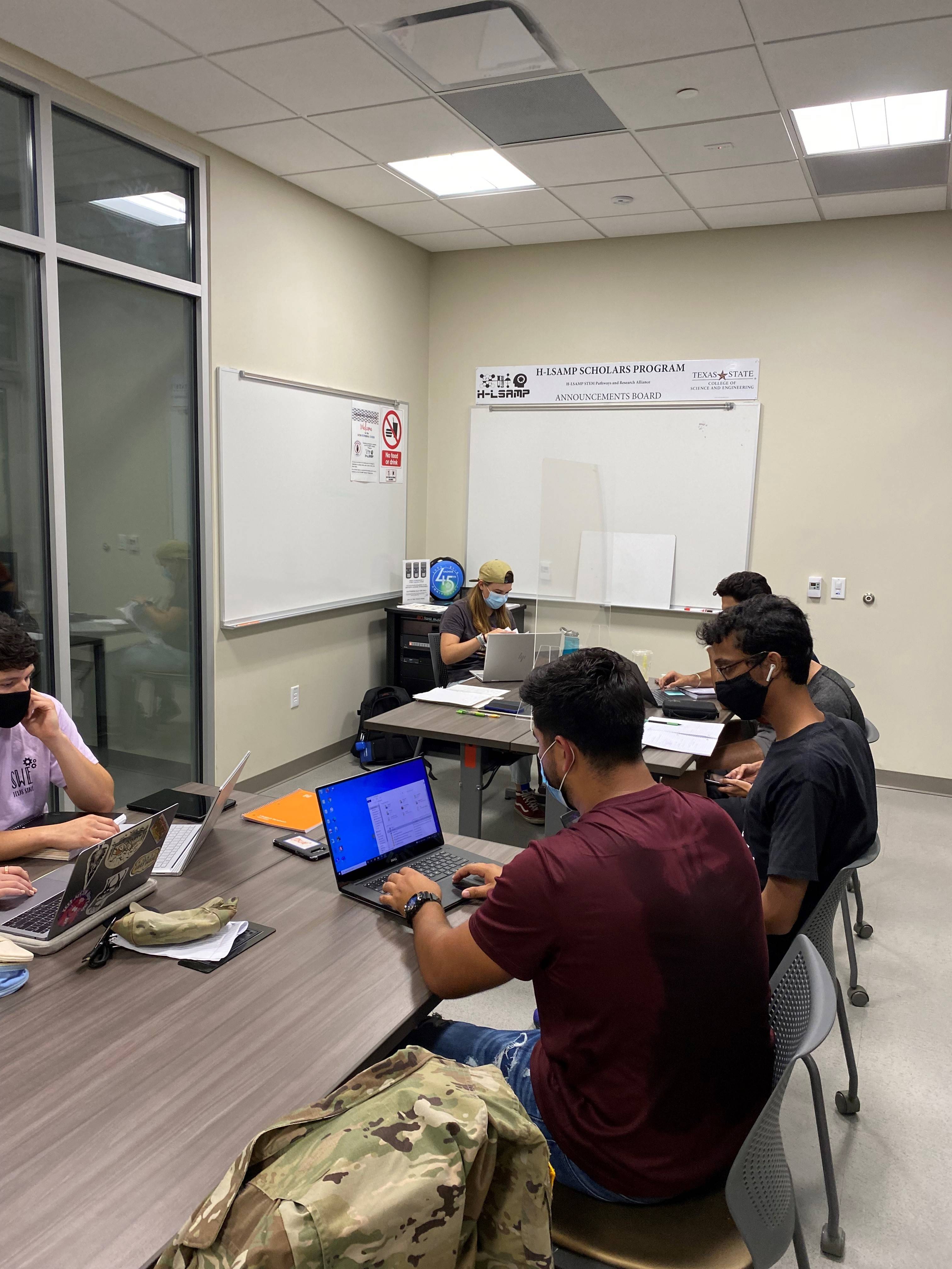 Image of students in the tutoring center