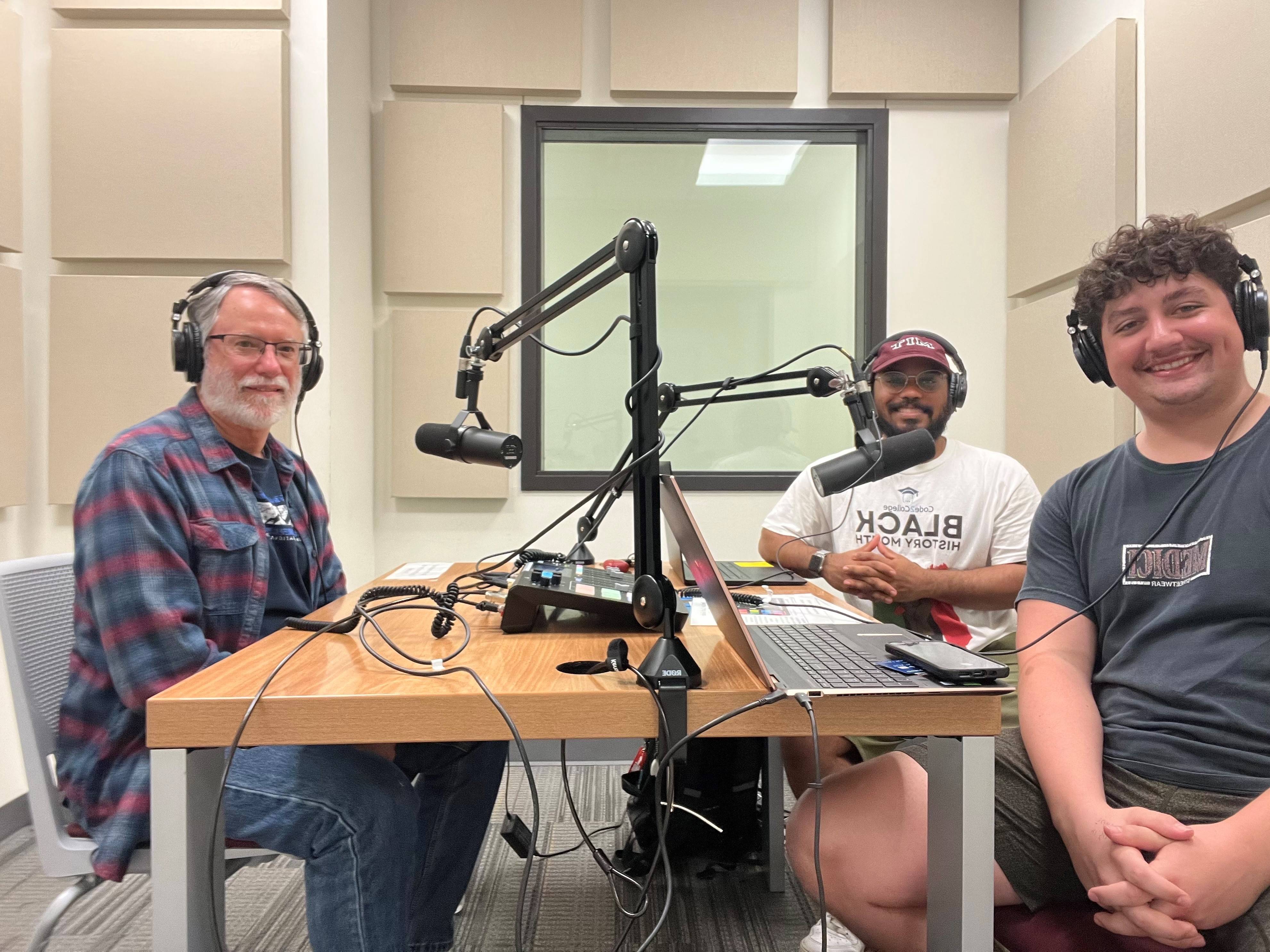 Image of students recording podcast with H-LSAMP director