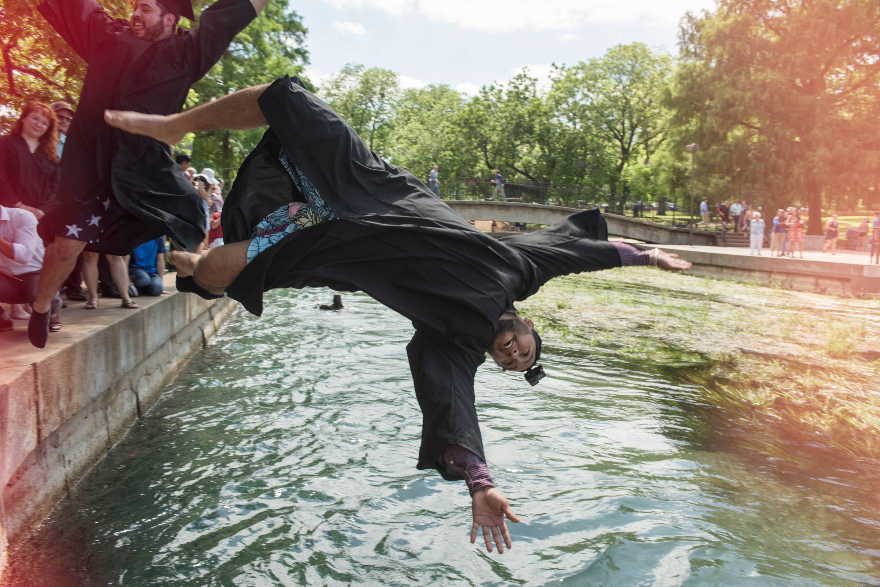 Grad back flipping into the river with a GoPro