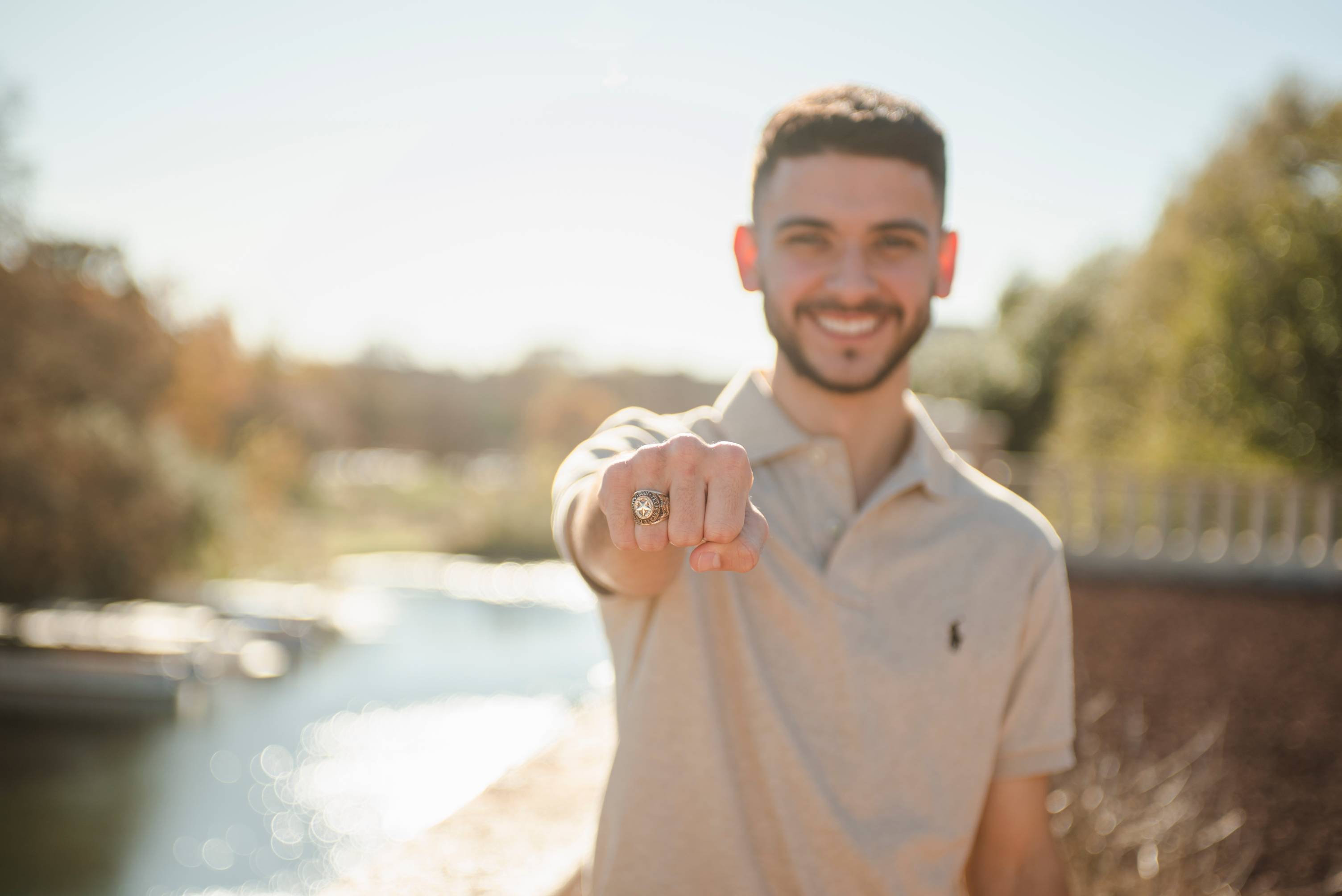 TXST male student showing his ring