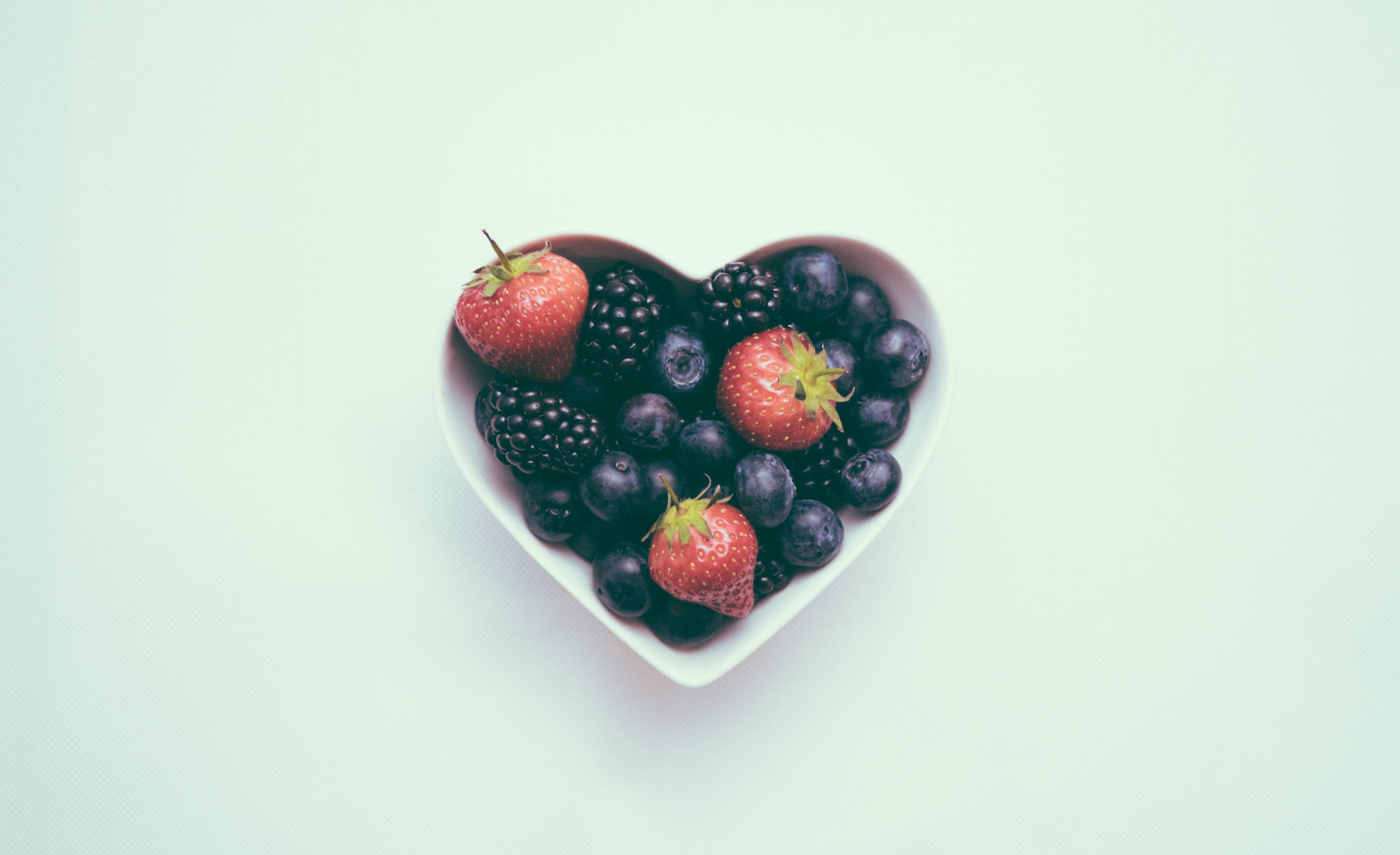 berries in a heart-shaped bowl