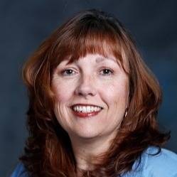 a portrait of Dana Chapman, Senior Administrative Assistant
