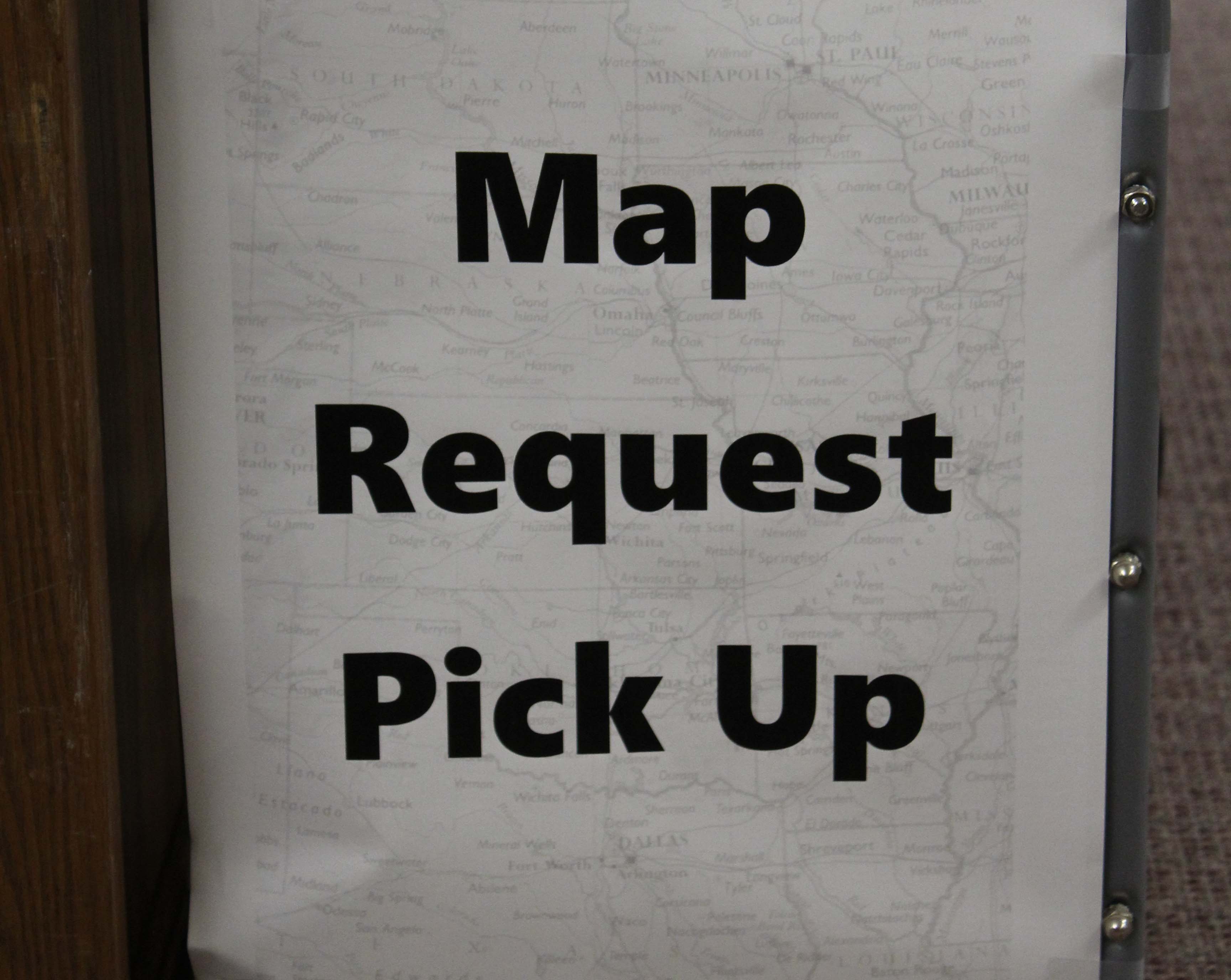 a sign that says "map request pick up"