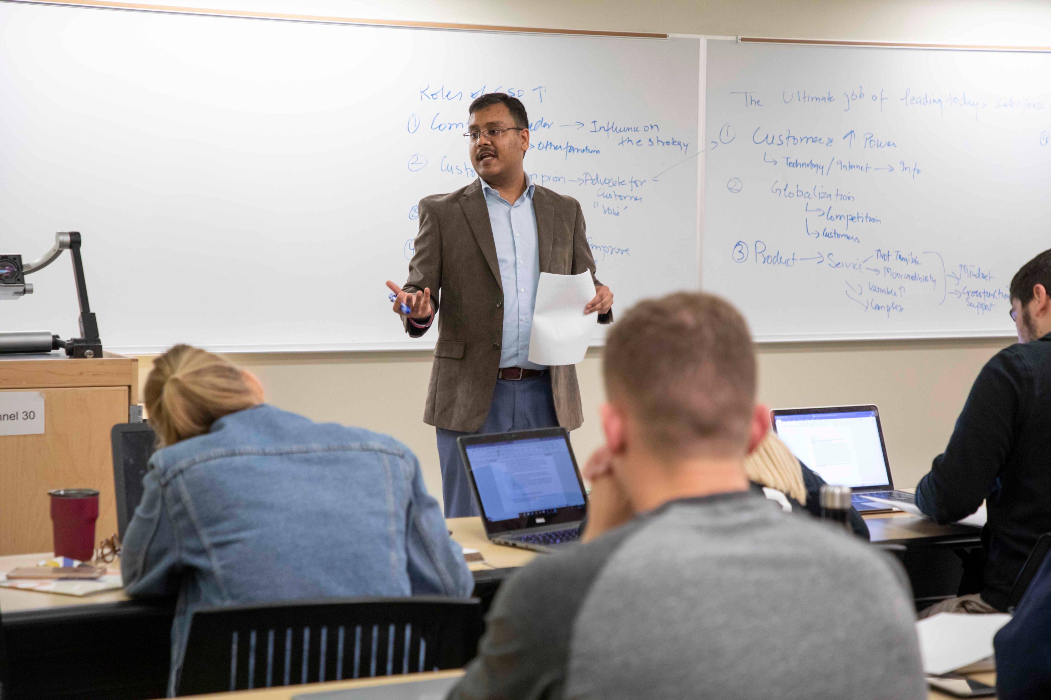 Dr. Gupta teaching an undergraduate class
