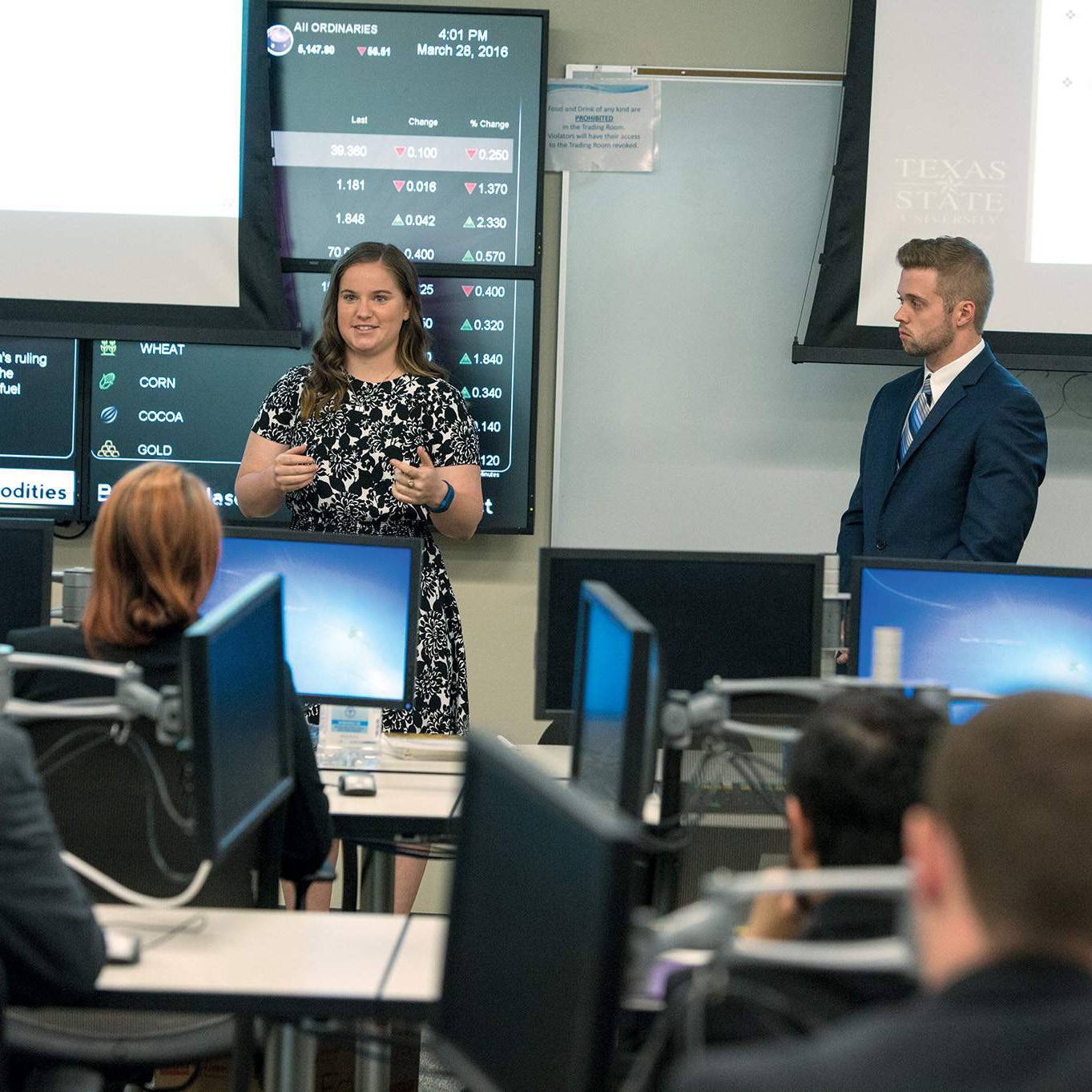 Students presenting in finance class