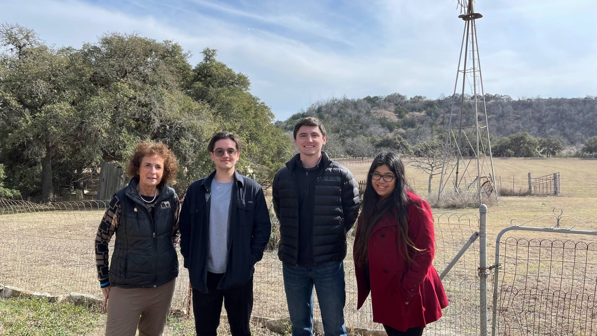 Dr. Janet Hale and students outside at a ranch