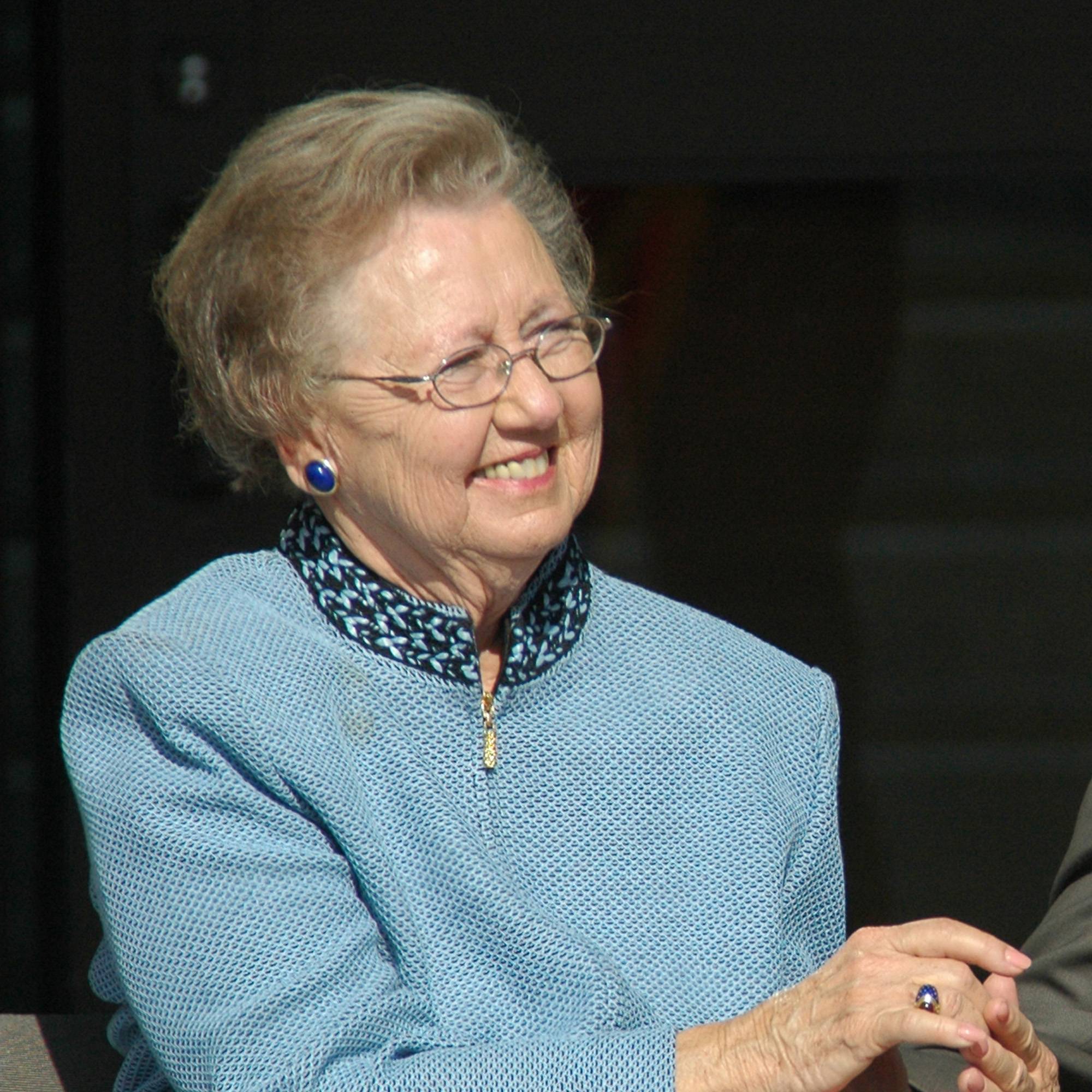 Miriam McCoy smiling at the dedication of McCoy Hall in 2006
