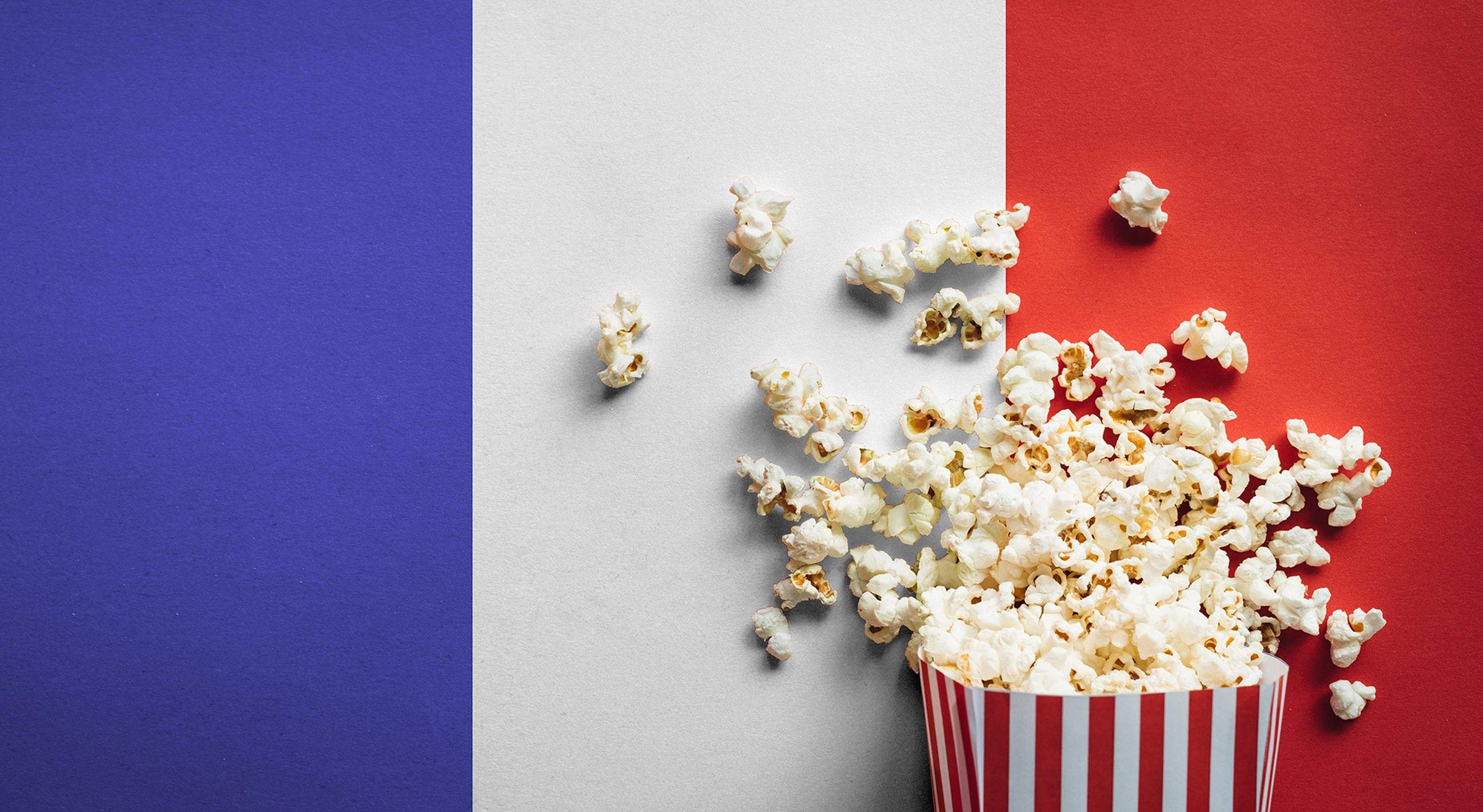 A box of popcorn superimposed over the French flag
