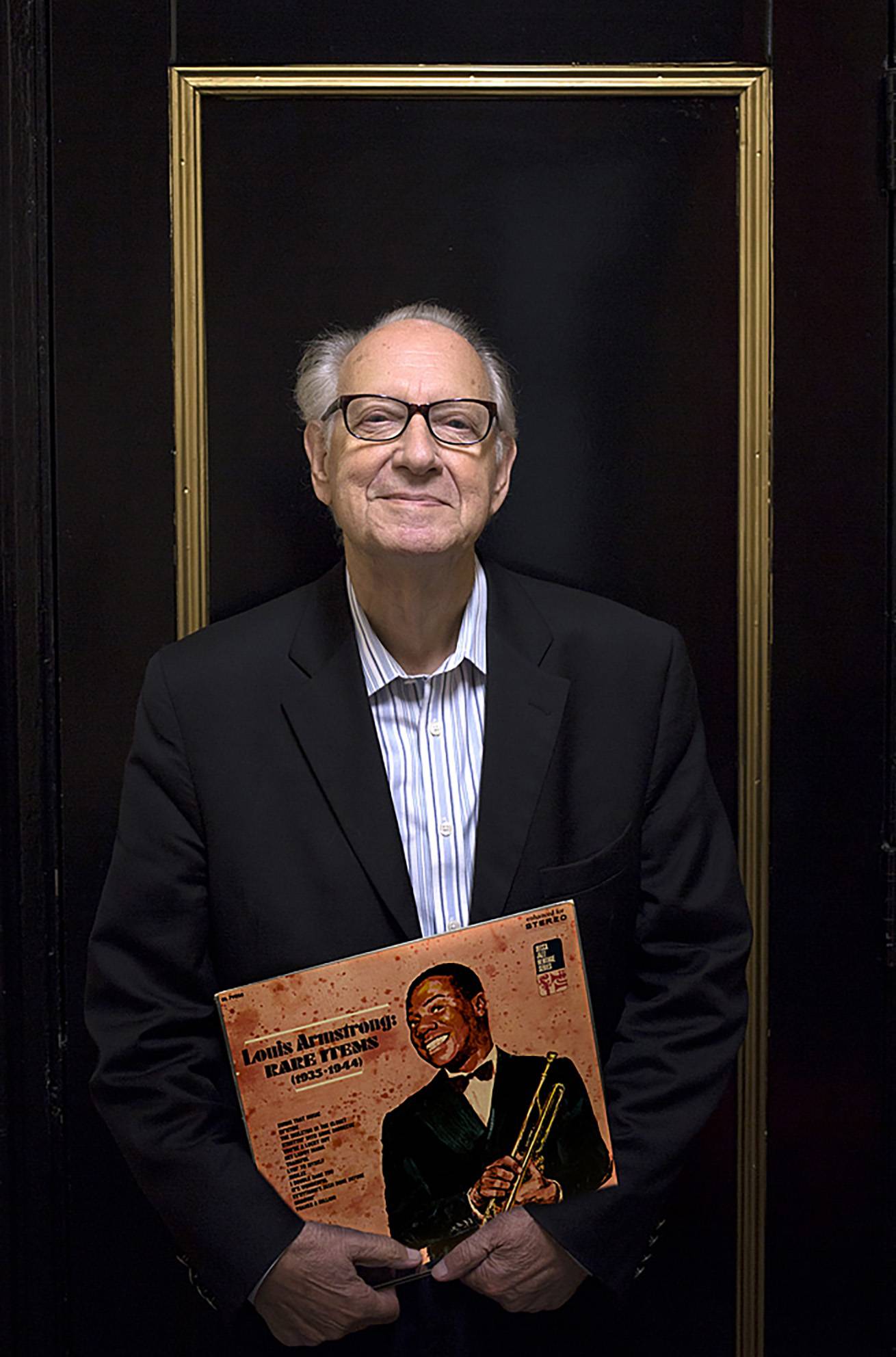 Dan Morgenstern with Louis Armstrong record