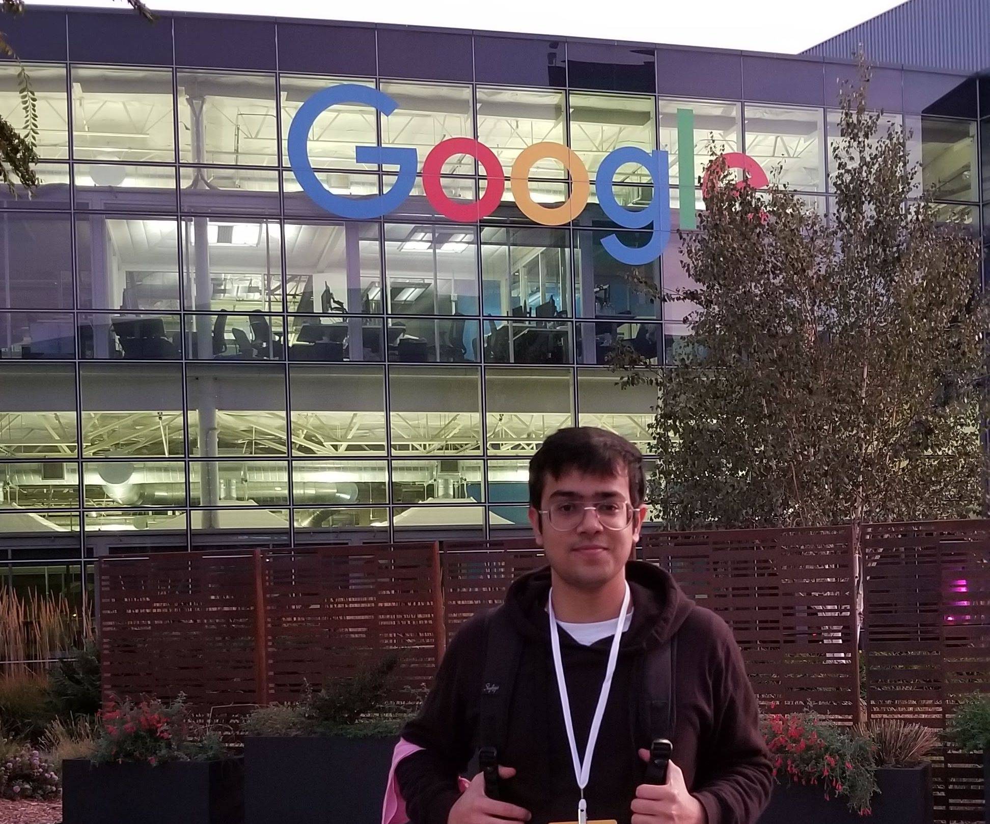Jadon taking a picture outside of google headquarters