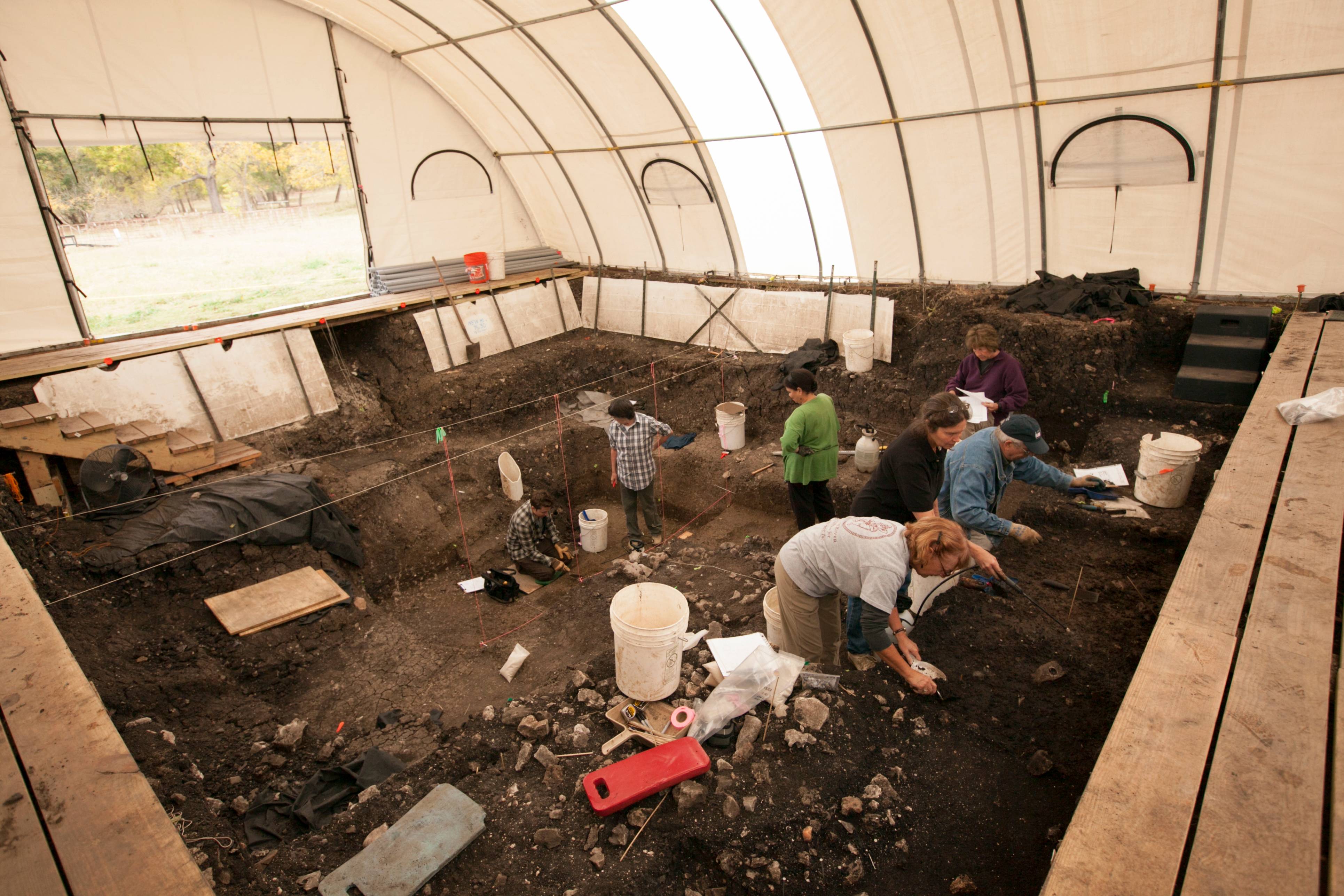 archeology site with people working