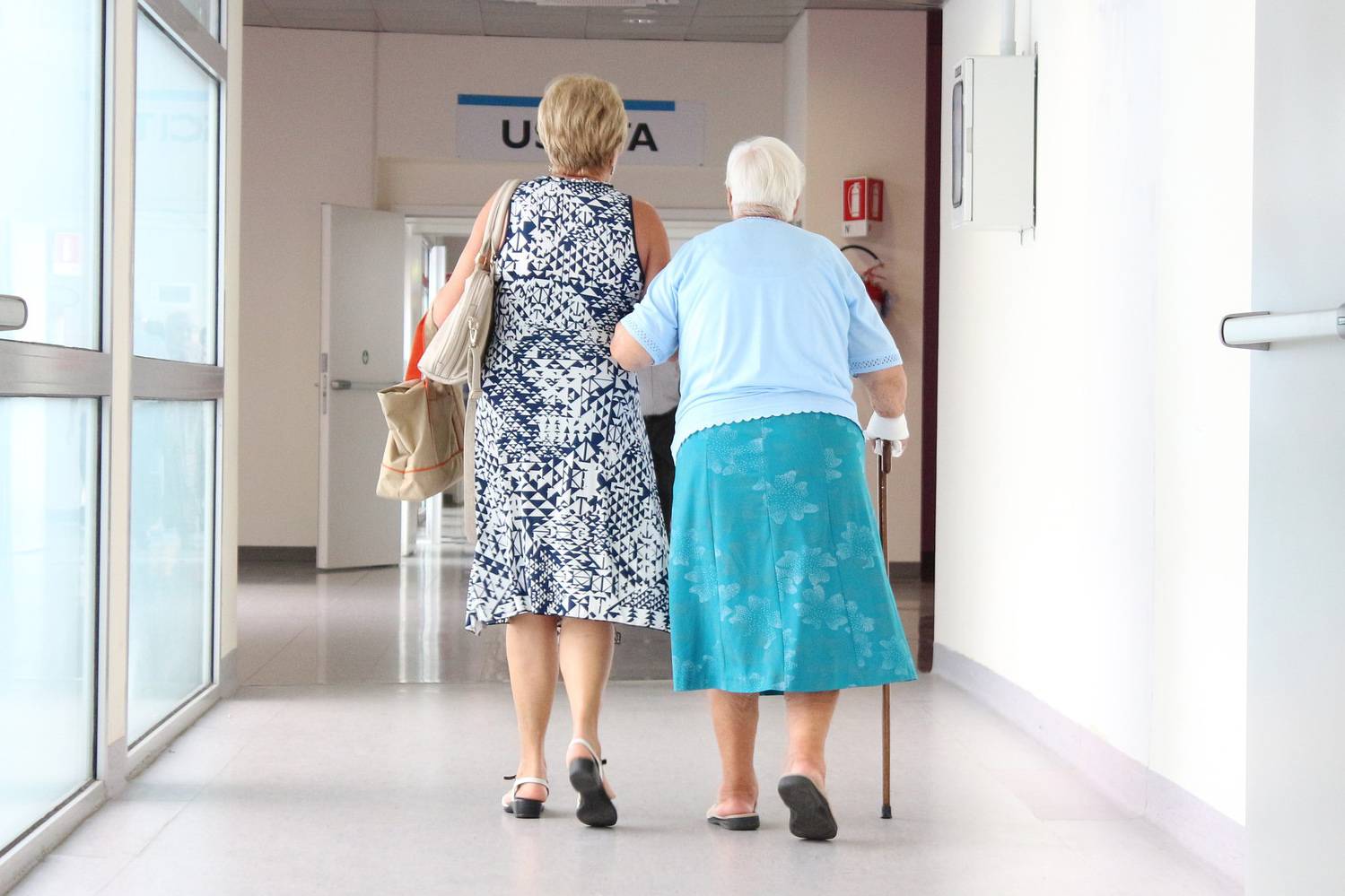 women walking in hospital
