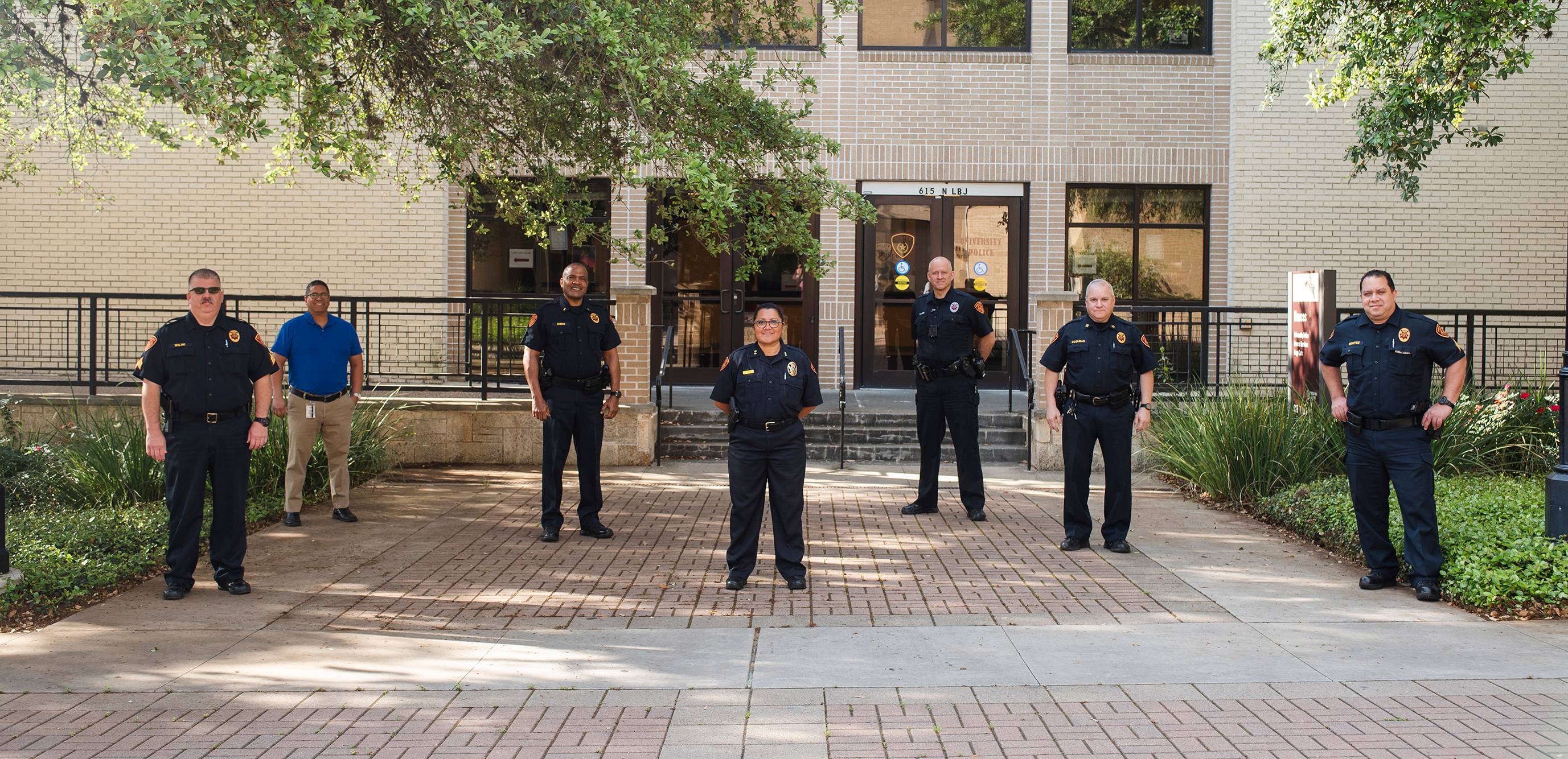 police officers standing outside office