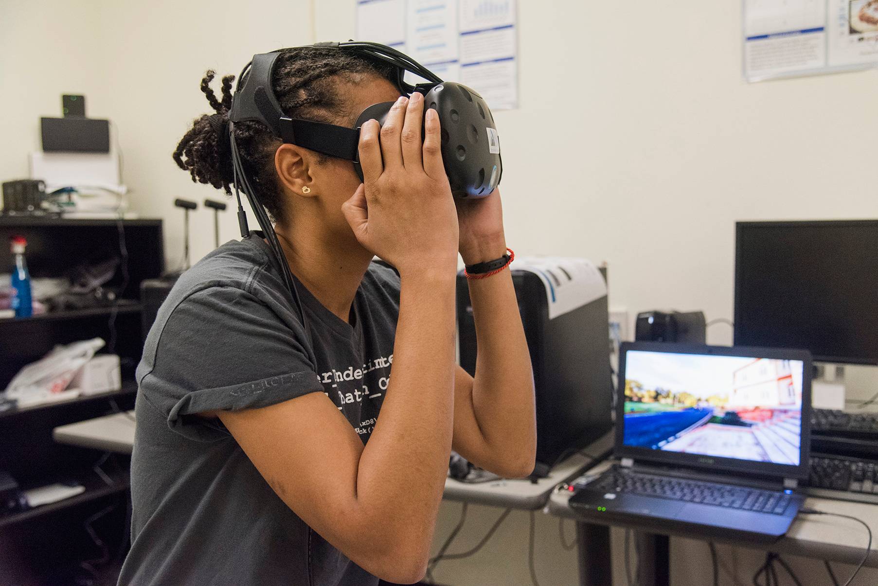 young woman wearing VR headset