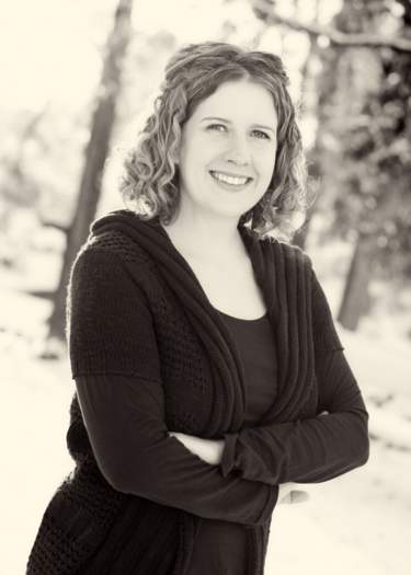 black and white photo of woman smiling