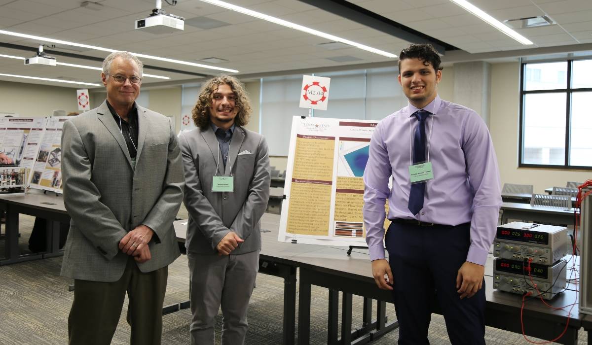 Michael Green, Andrew Wilhite, Rodolfo Olivares Tamayo in front of their project