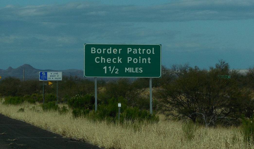 border patrol sign on side of road