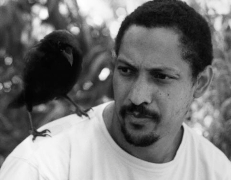 percival Everett with a bird on his shoulder