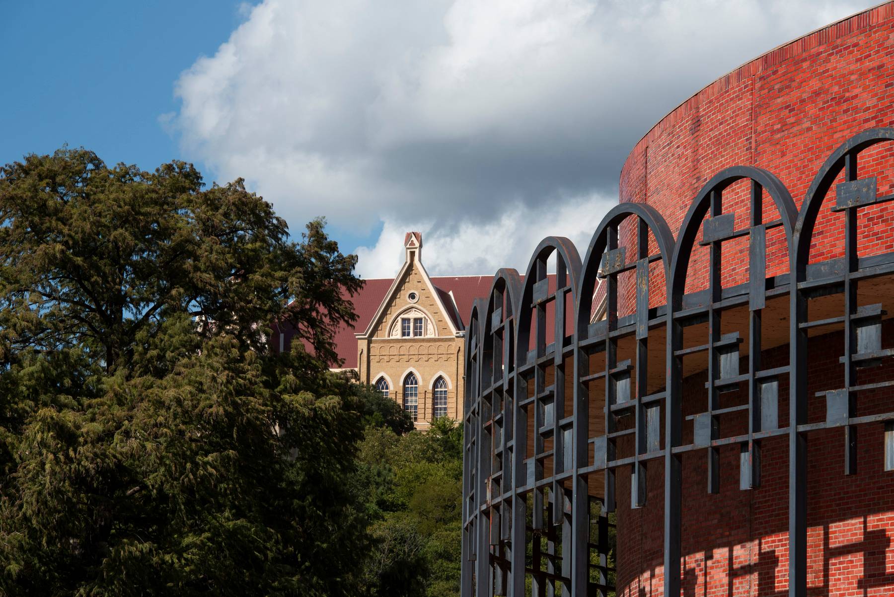 In the top right an up close of the theater center can be seen looking towards Old Main in the background.