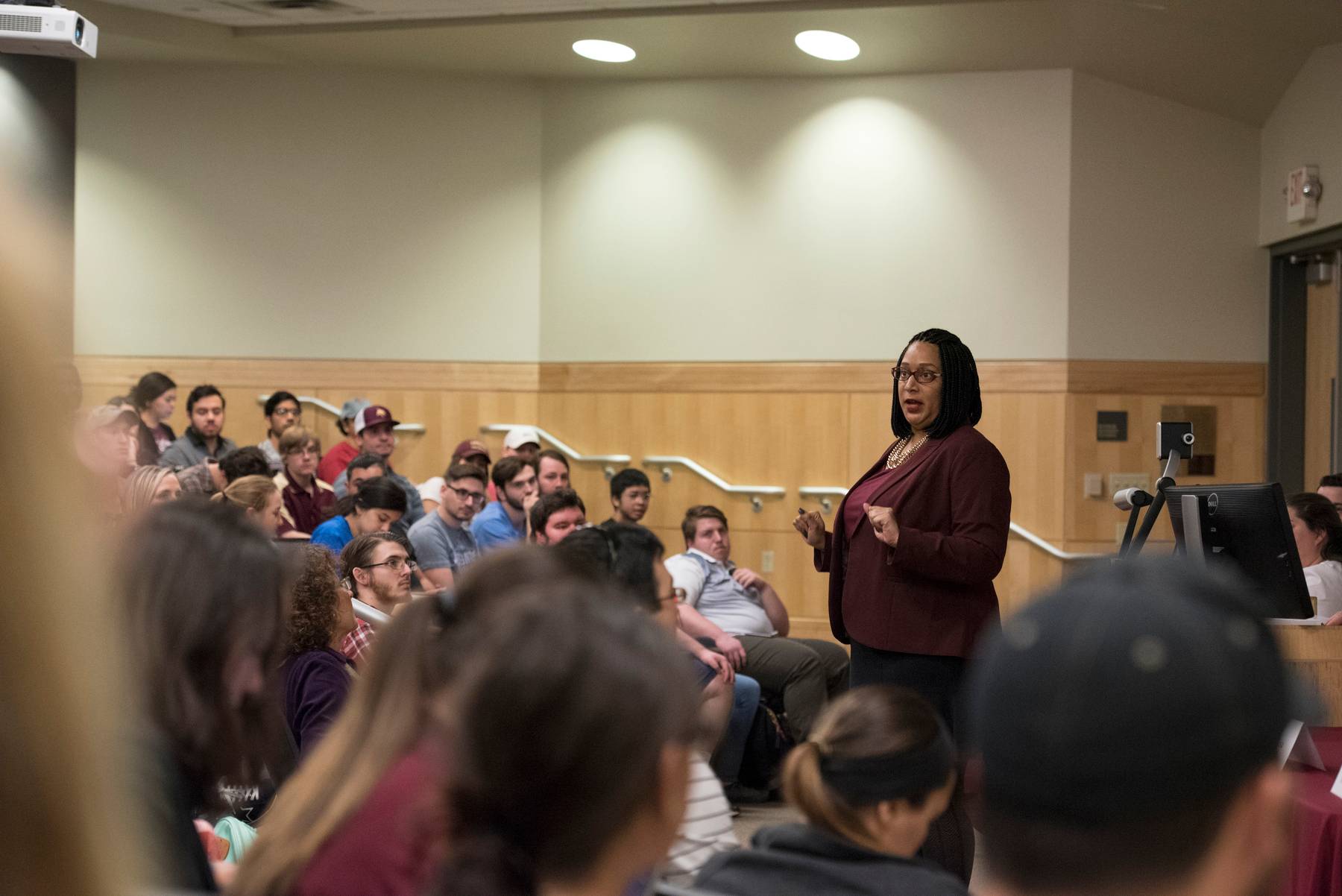 Faculty instructing lecture.