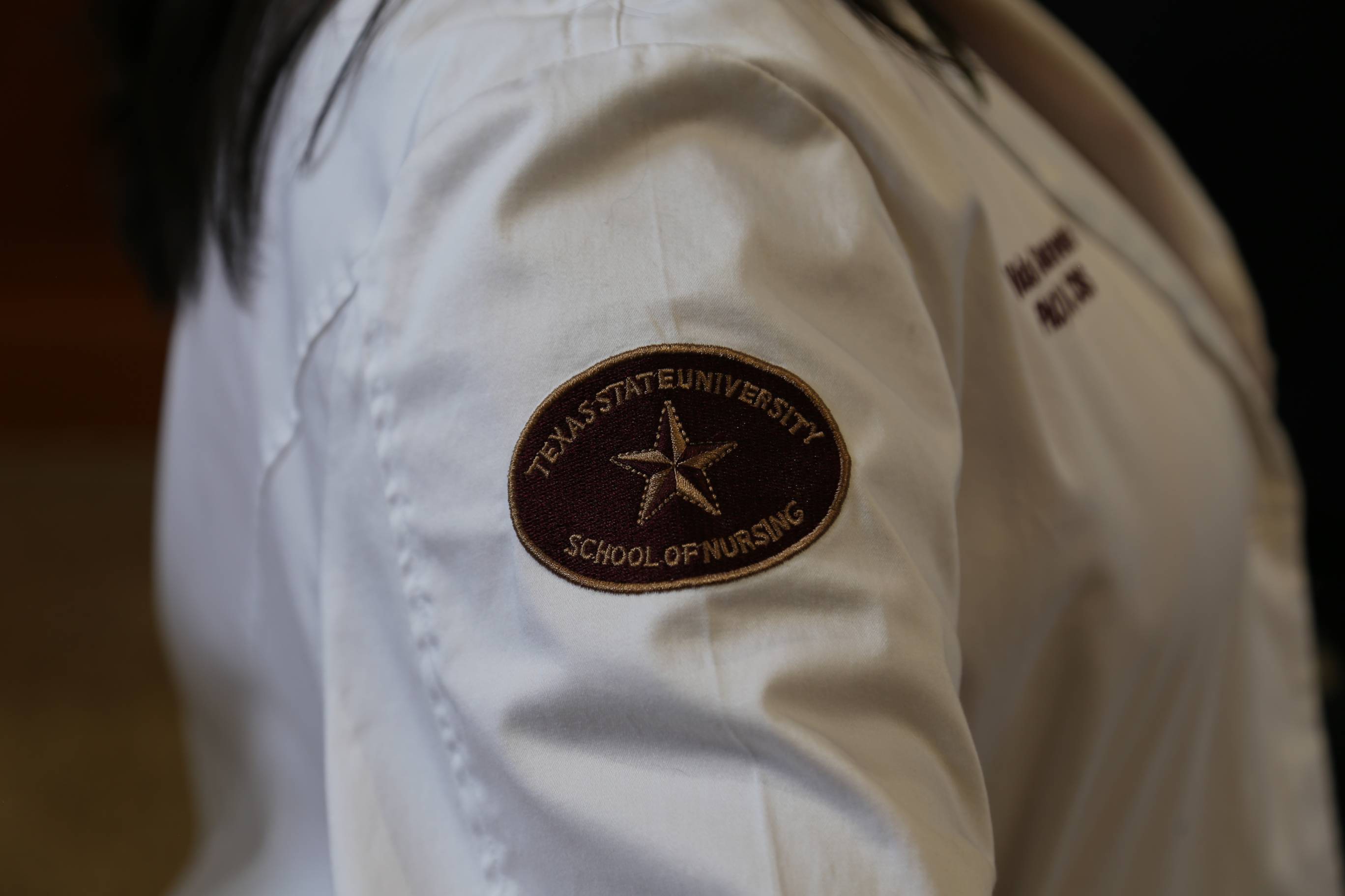 Nursing patch on lab coat