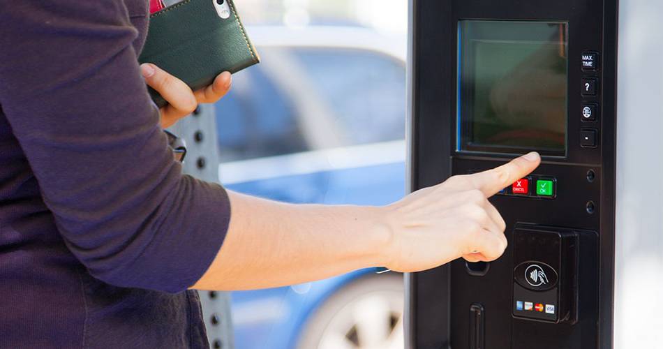 Student using a Pay-and-Display station