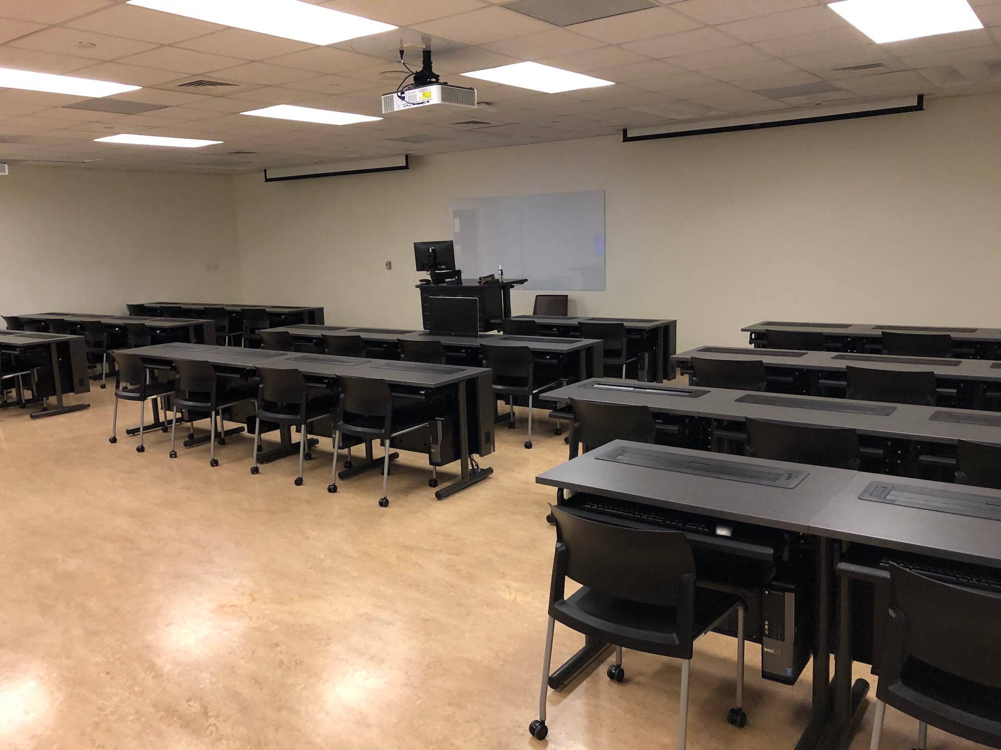 Image of the UAC 440 computer lab showing all 42 computer stations, projectors, and technology