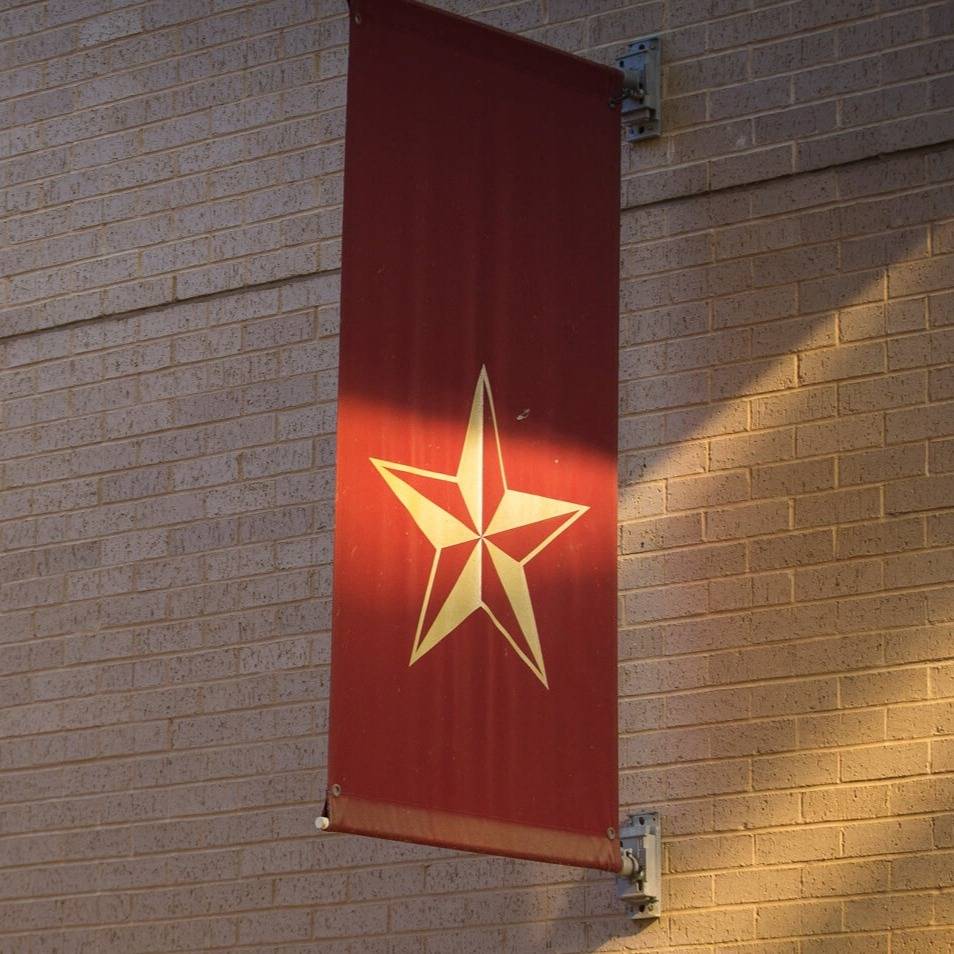 star banner on the side of a building