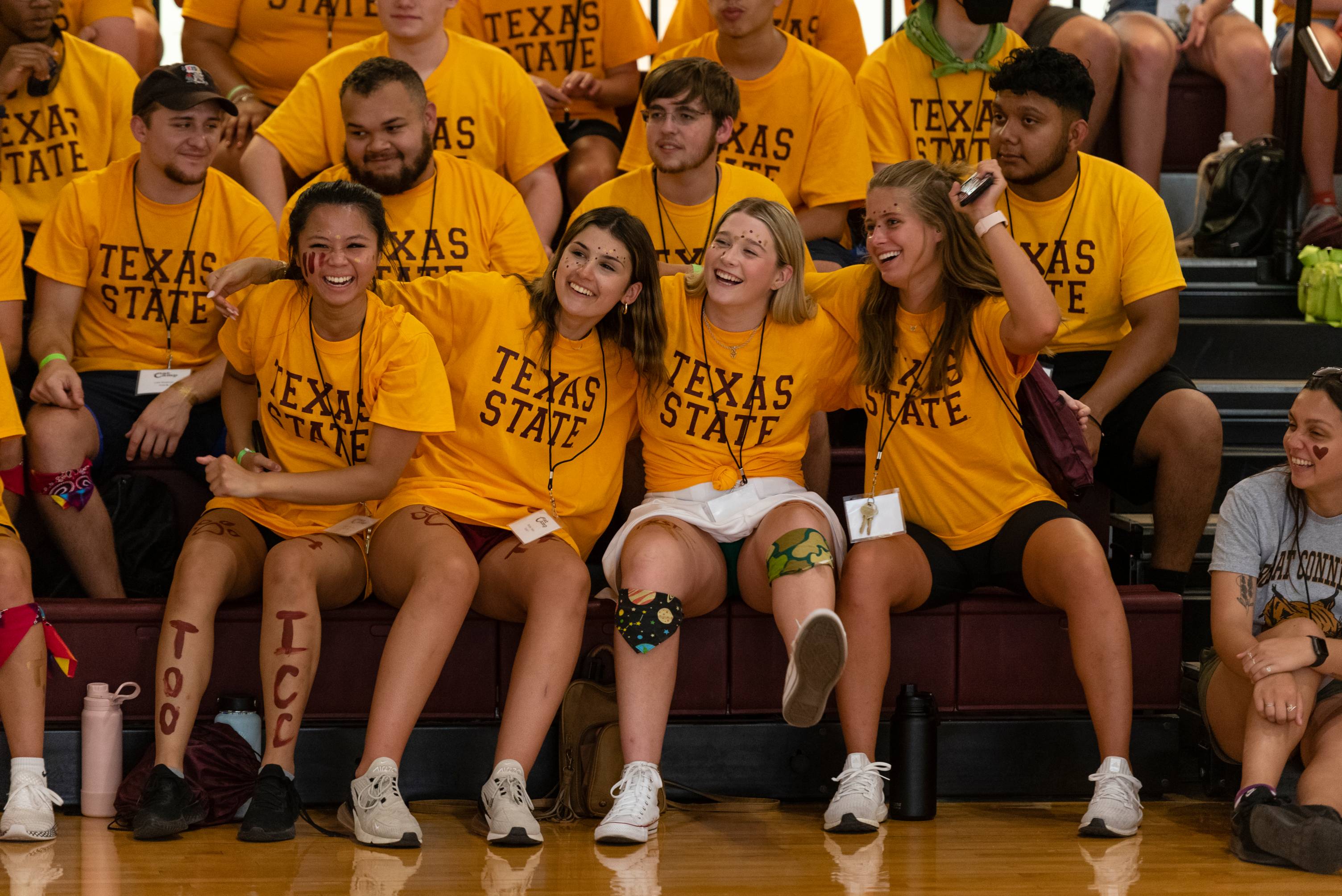 Students taking a selfie outside