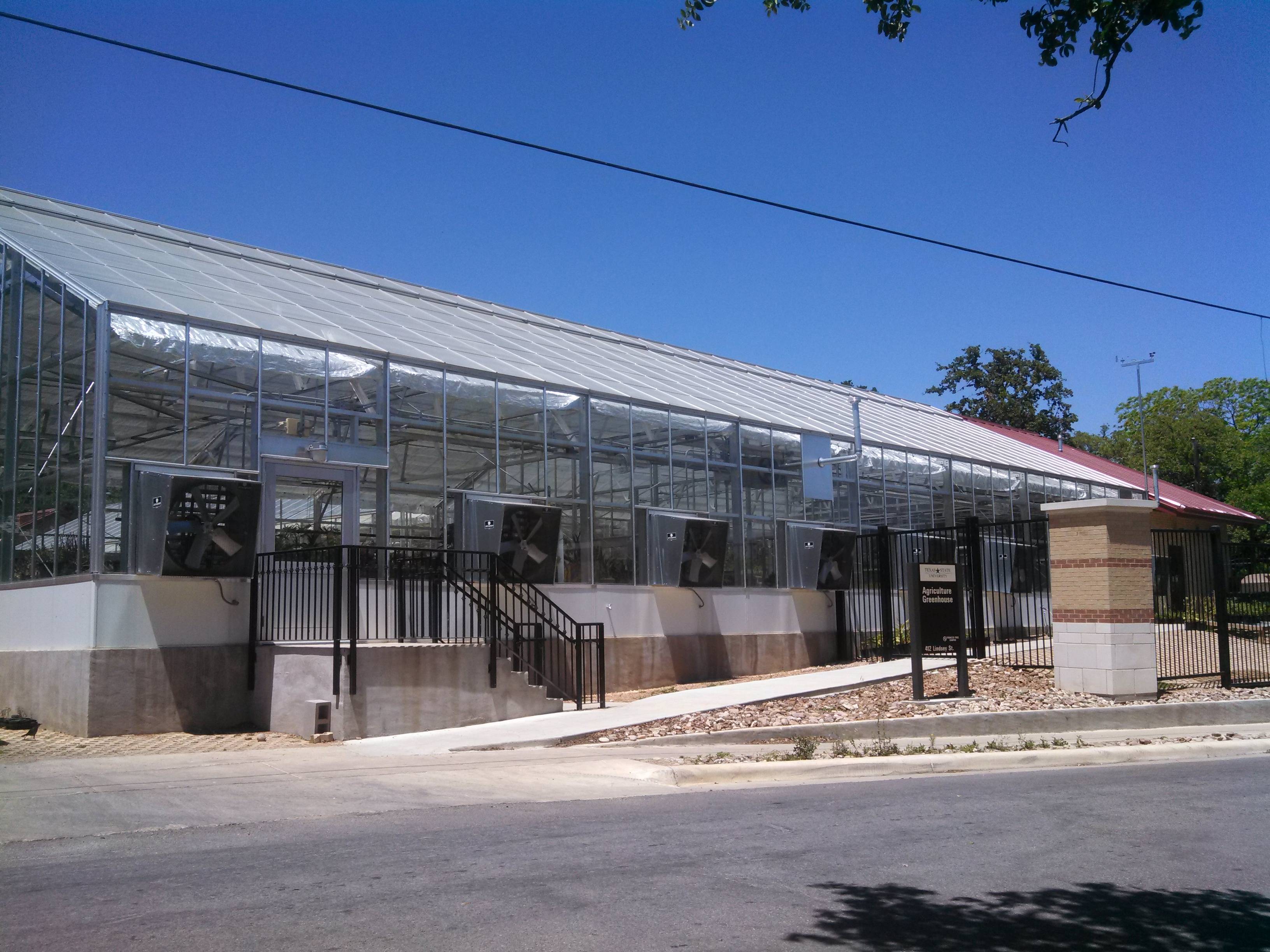 exterior of large greenhouse