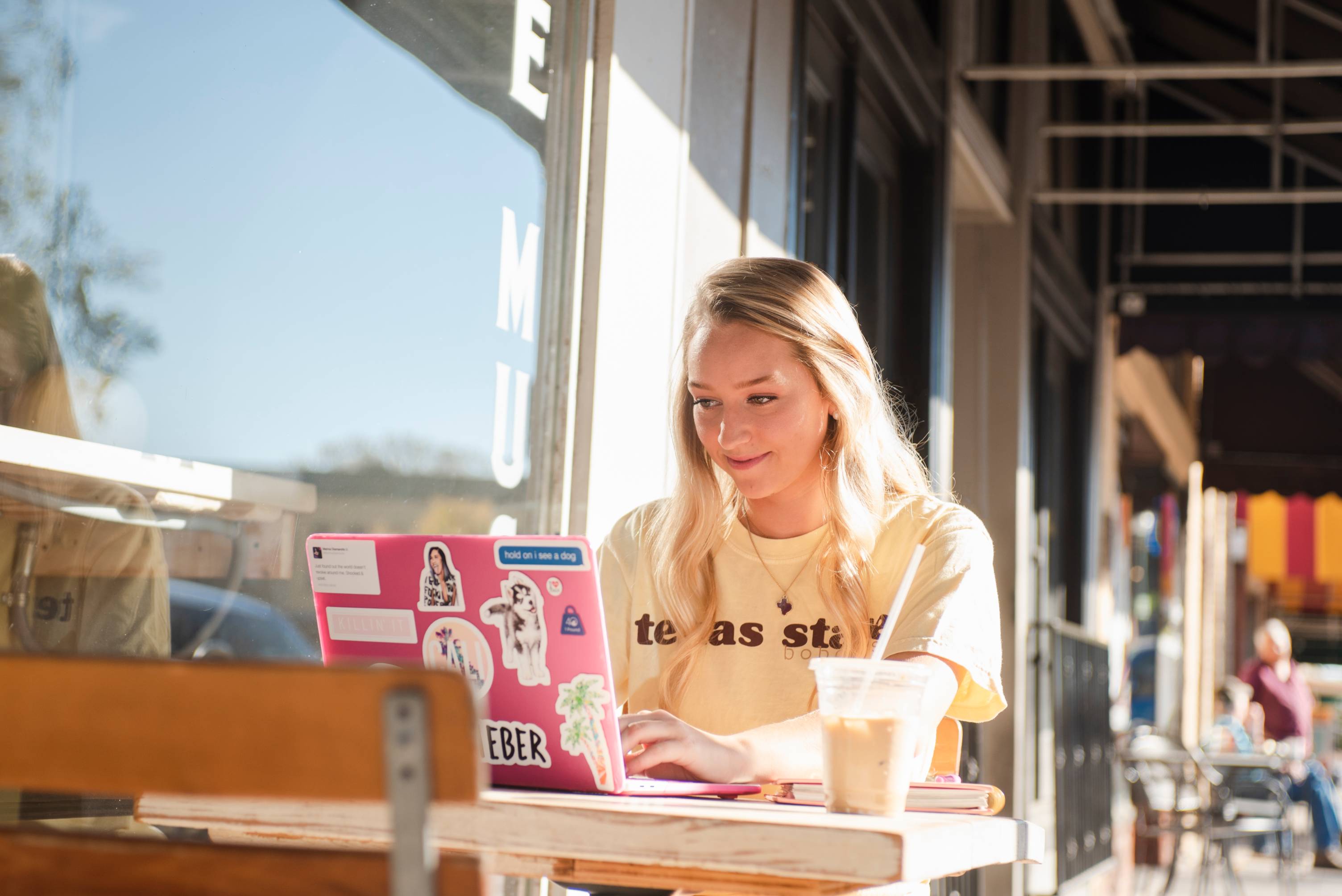 student studying on their laptop