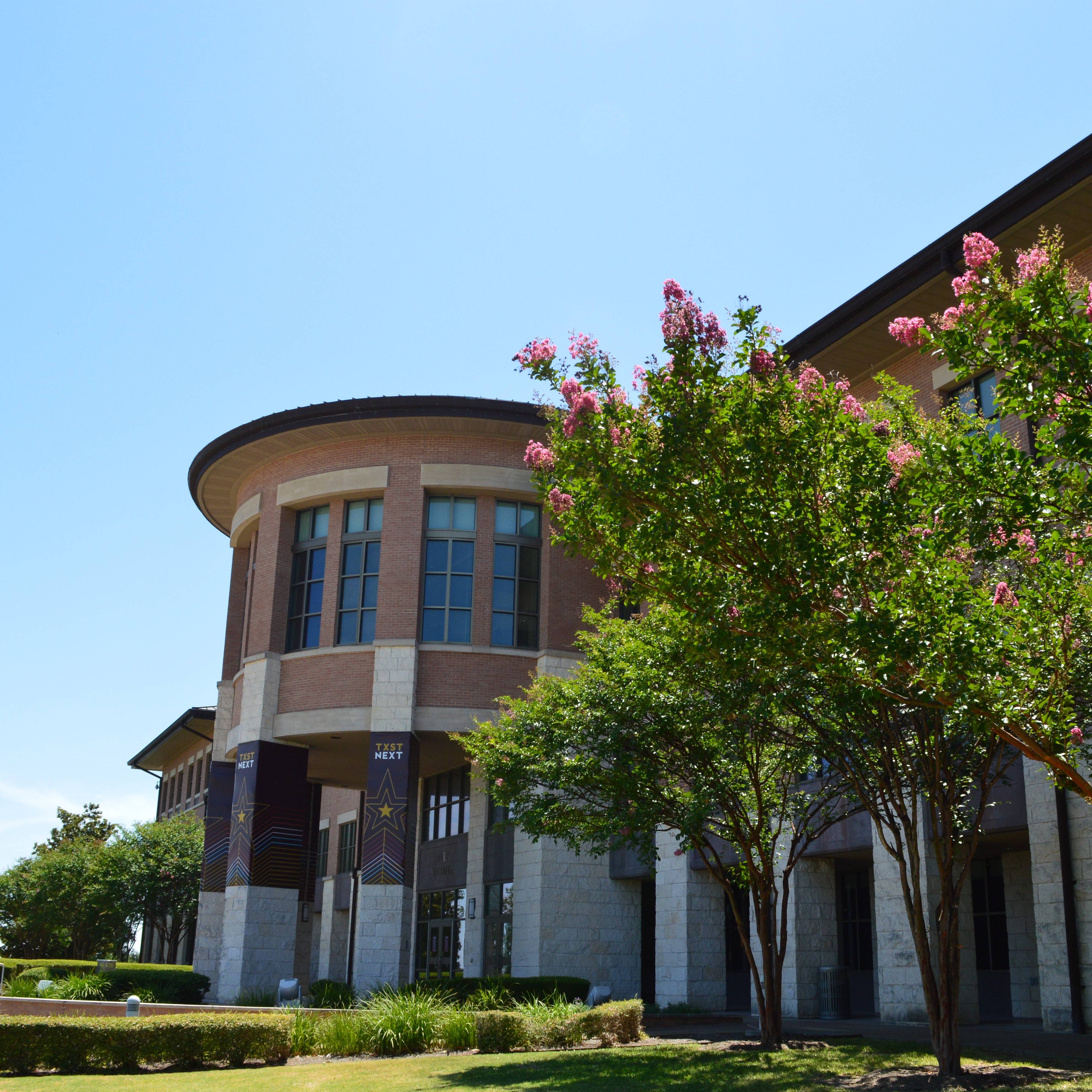 Avery building front entrance in the springtime