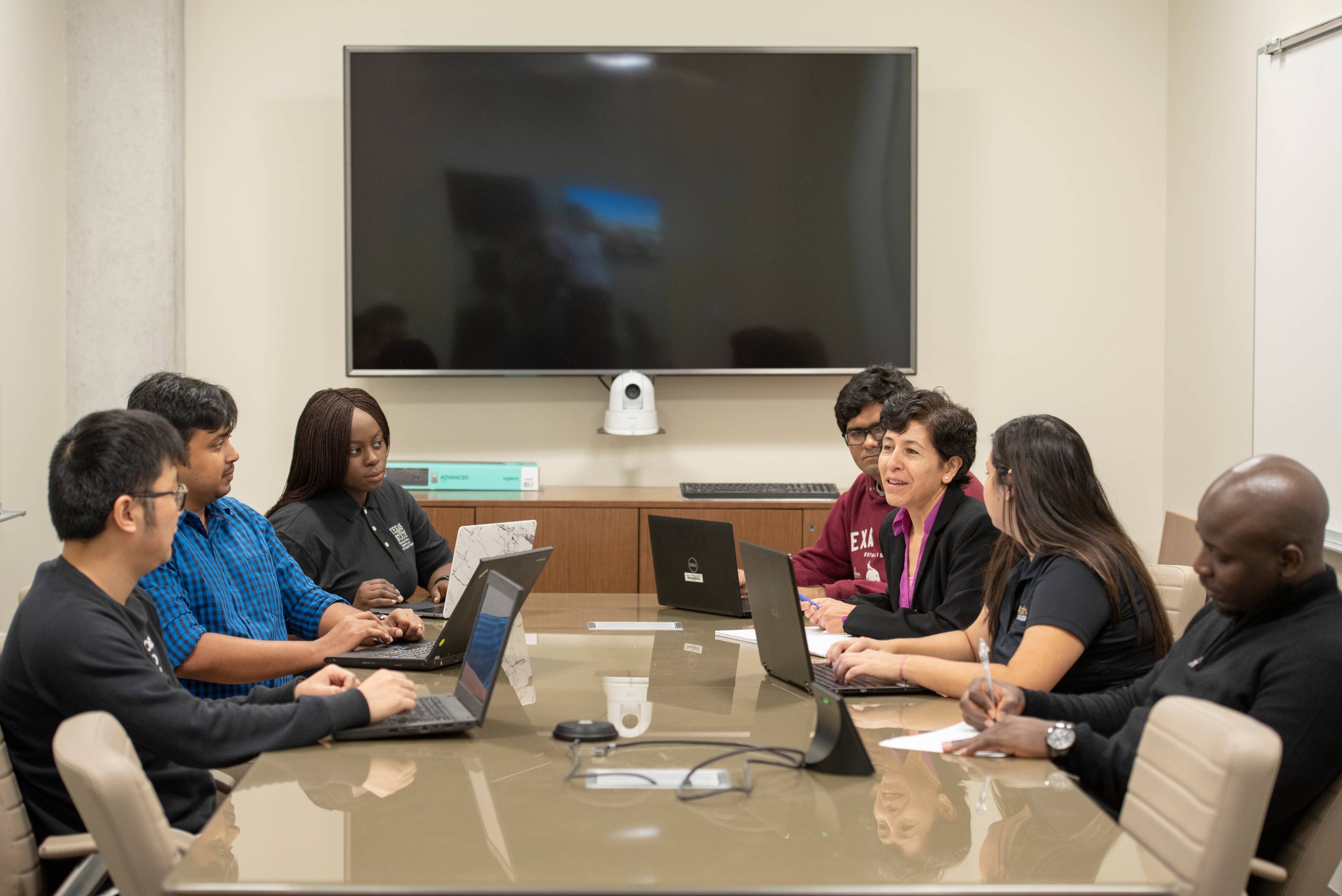 Faculty in a meeting