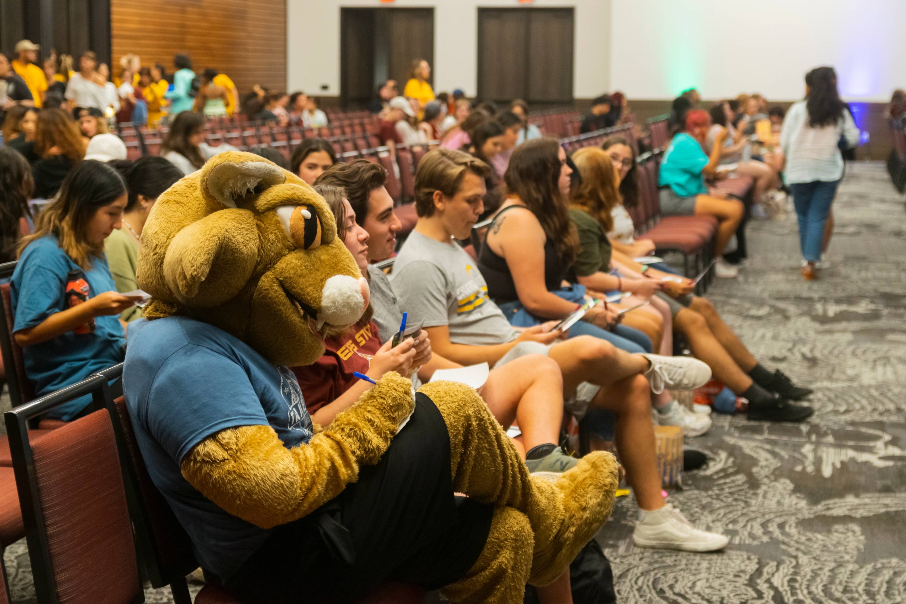 Boko sitting with the students during LBJSC's Takeover event