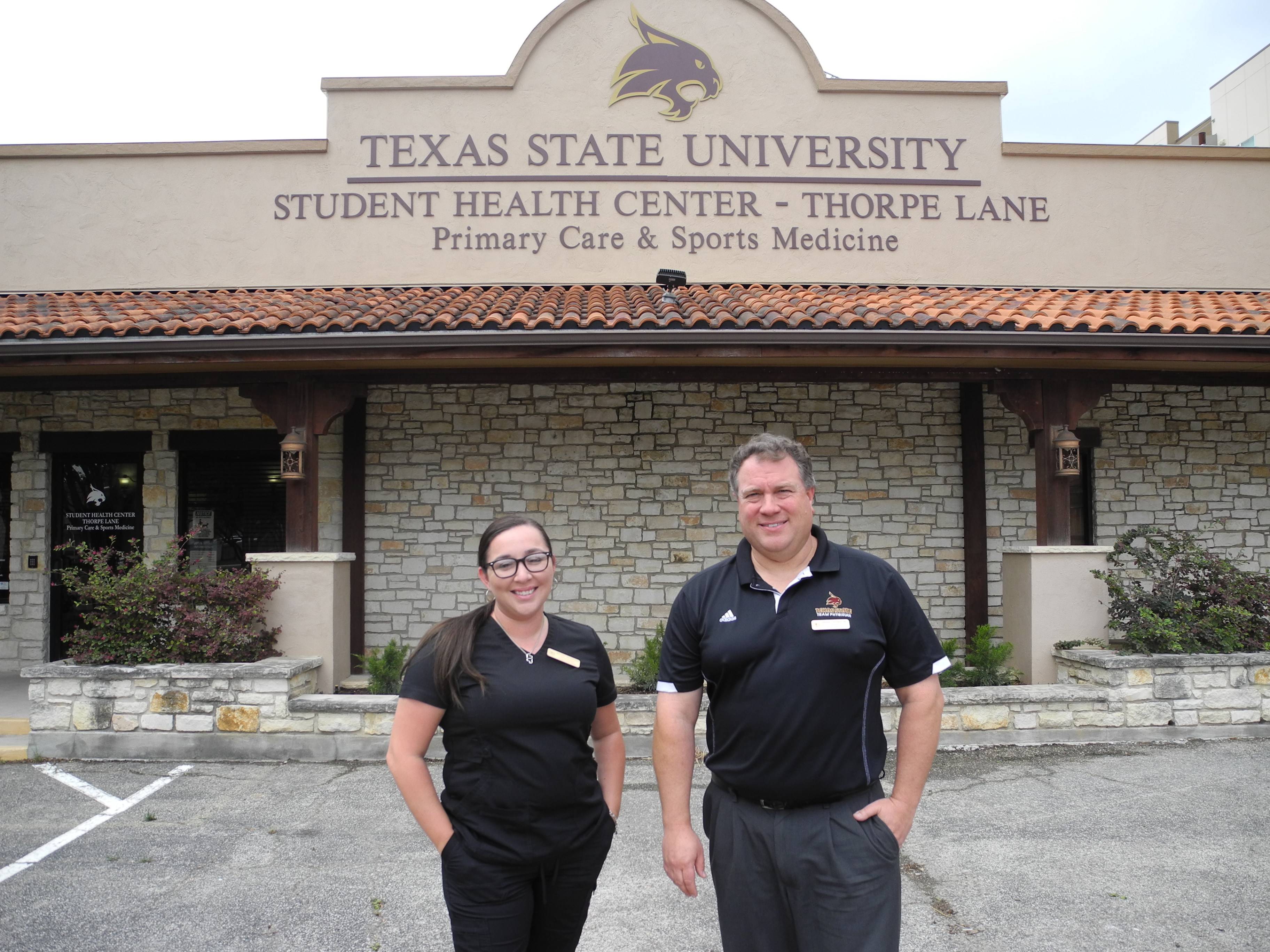 Thorpe Lane Staff standing in front of the Thorpe Lane Clinic.