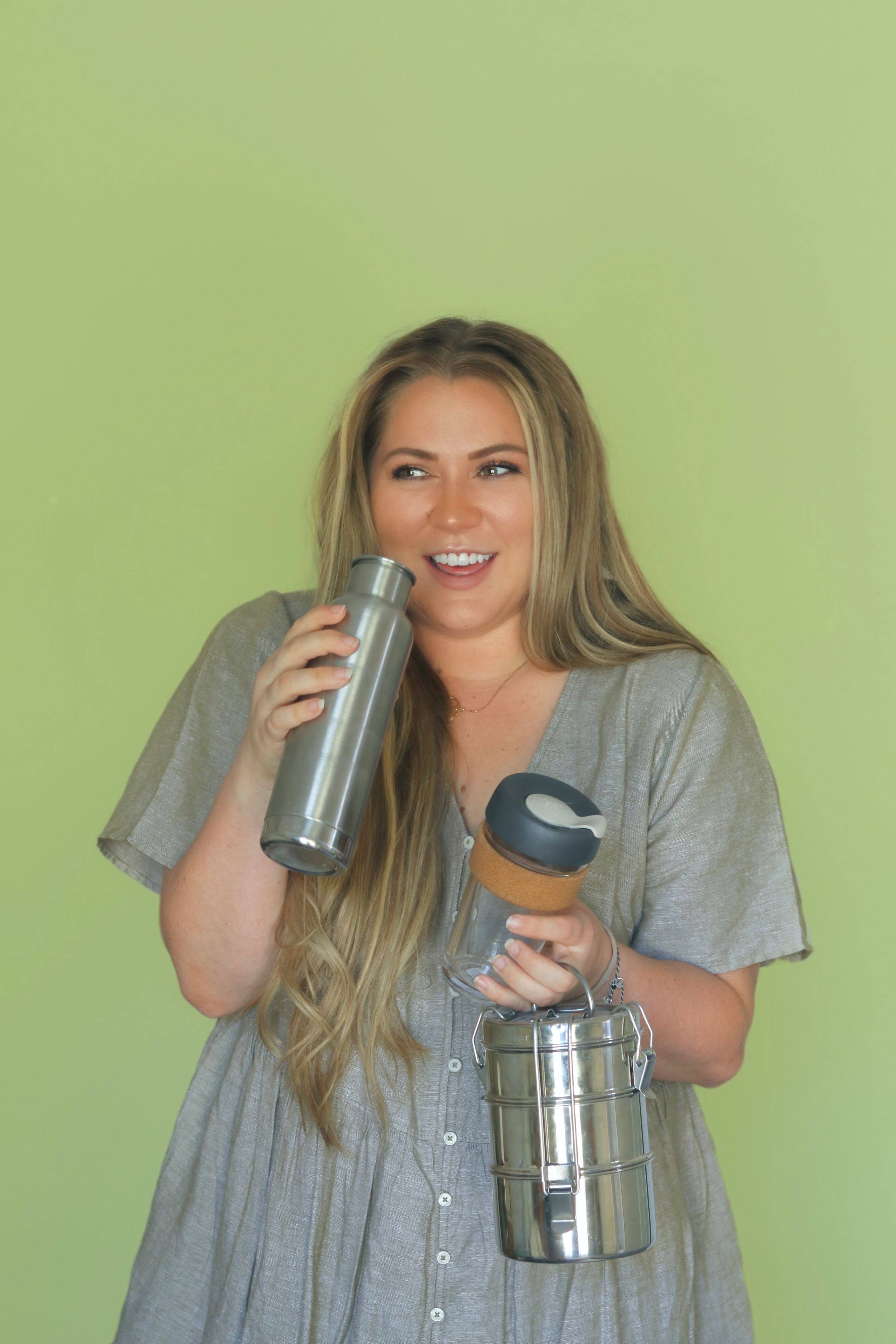 headshot of shelbi orme green background