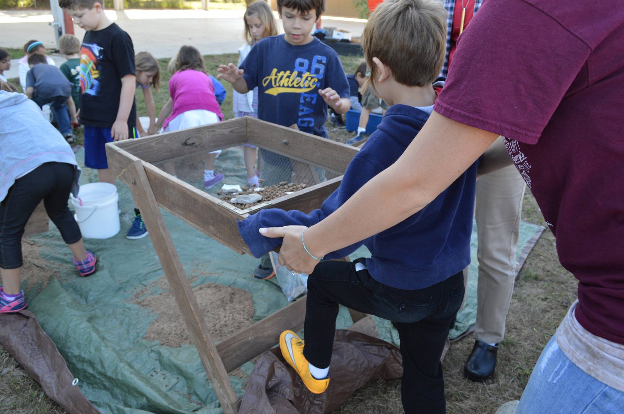 School children screening for artifacts